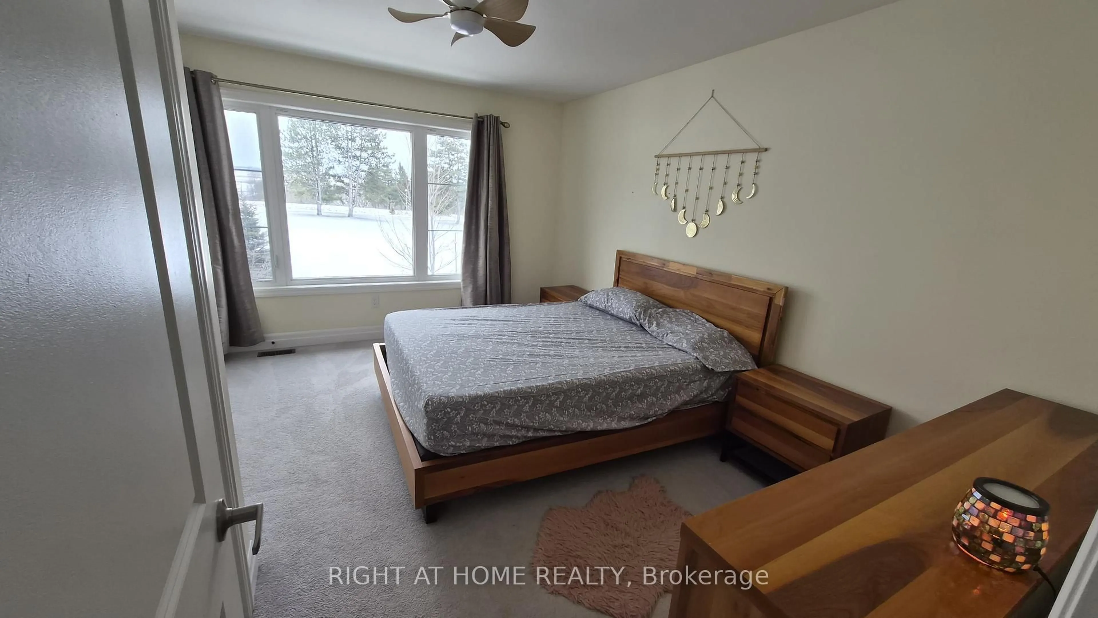 Bedroom with bed, wood/laminate floor for 384 Arctic Red Dr #34, Oshawa Ontario L1L 0M5