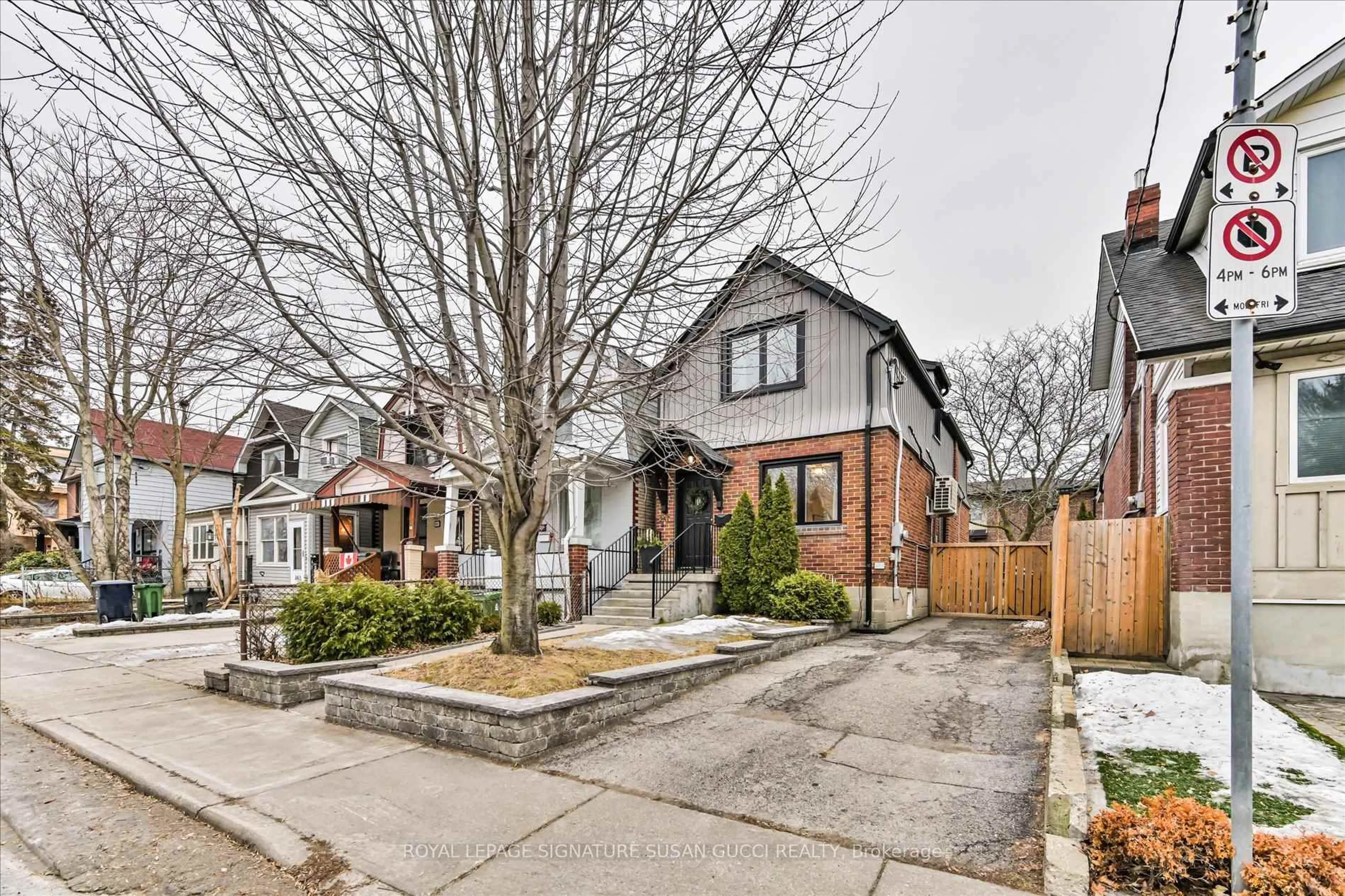 Home with brick exterior material, street for 257 Lumsden Ave, Toronto Ontario M4C 2K7
