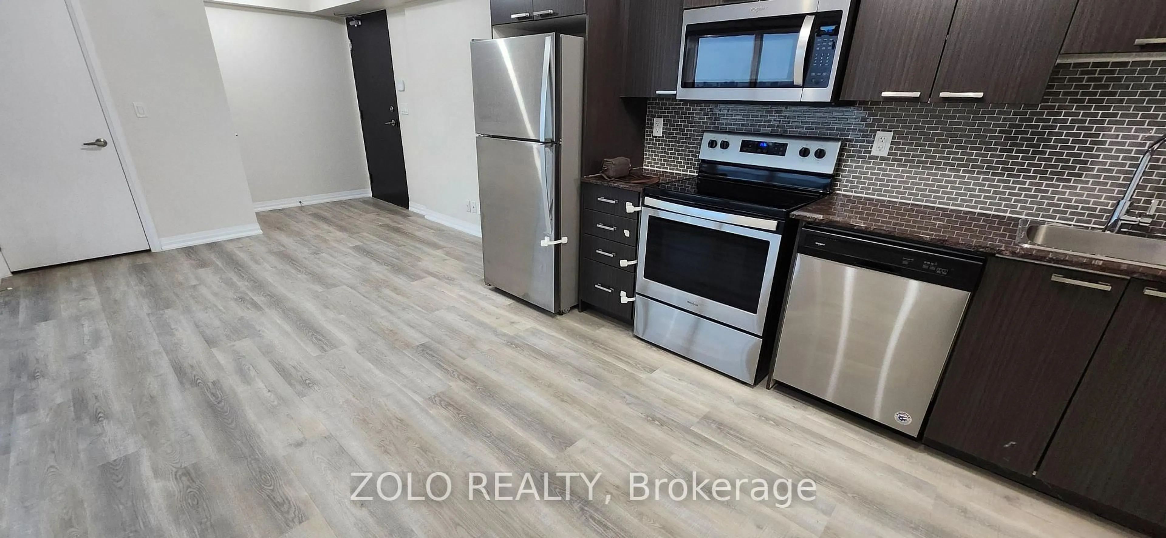 Open concept kitchen, unknown for 2150 Lawrence Ave #1703, Toronto Ontario M1R 3A7