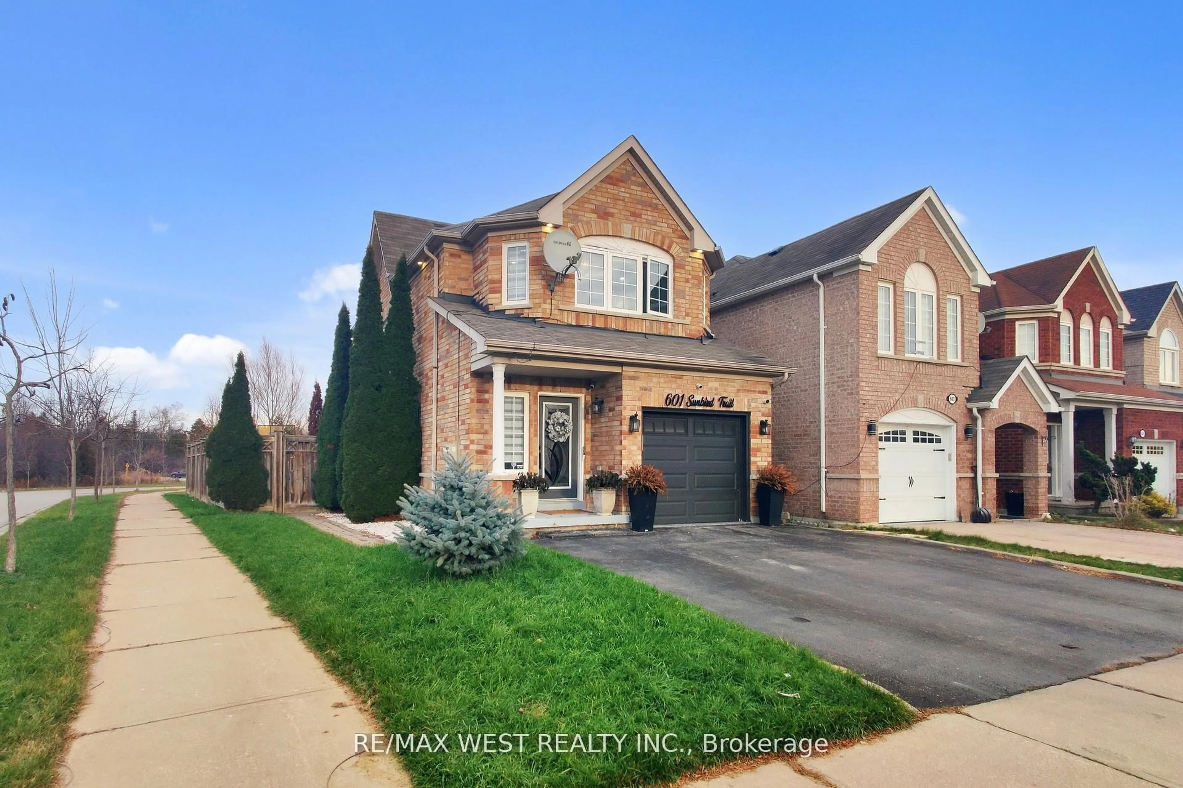 Home with brick exterior material, street for 601 Sunbird Tr, Pickering Ontario L1X 2X7