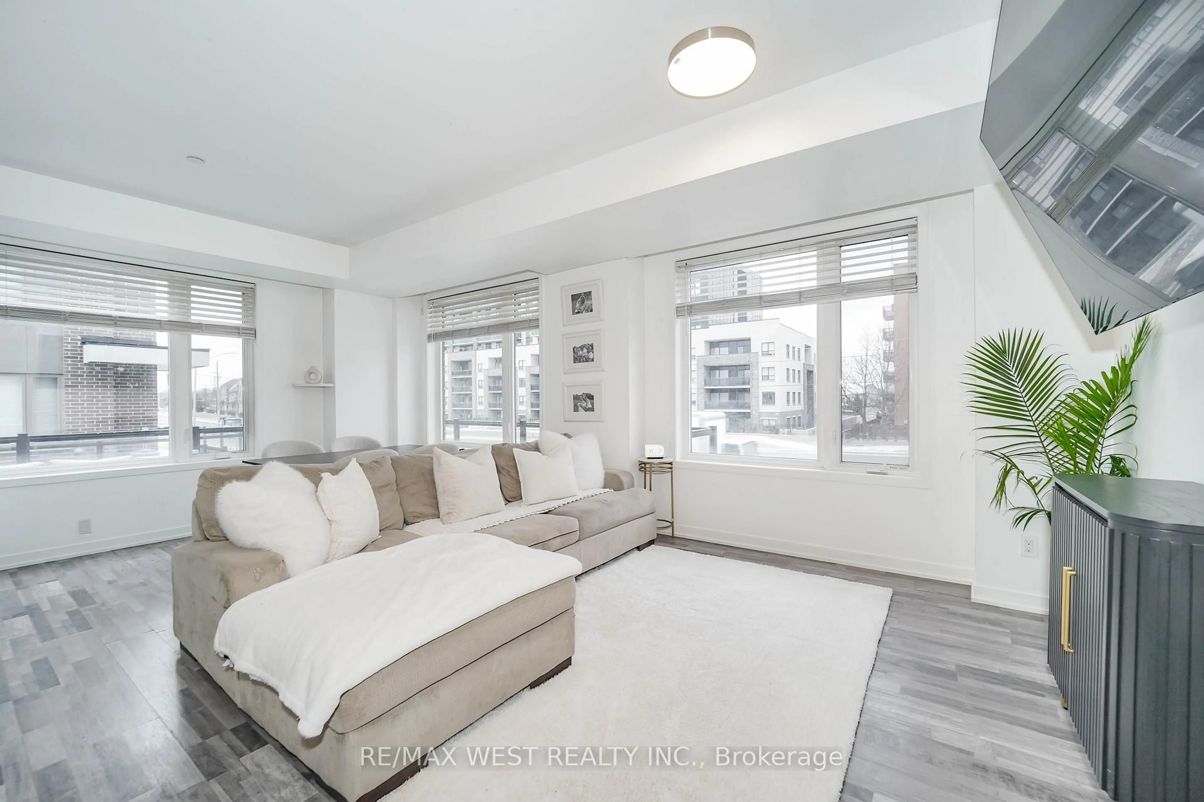 Living room with furniture, unknown for 1460 Whites Rd #211, Pickering Ontario L1V 0E8