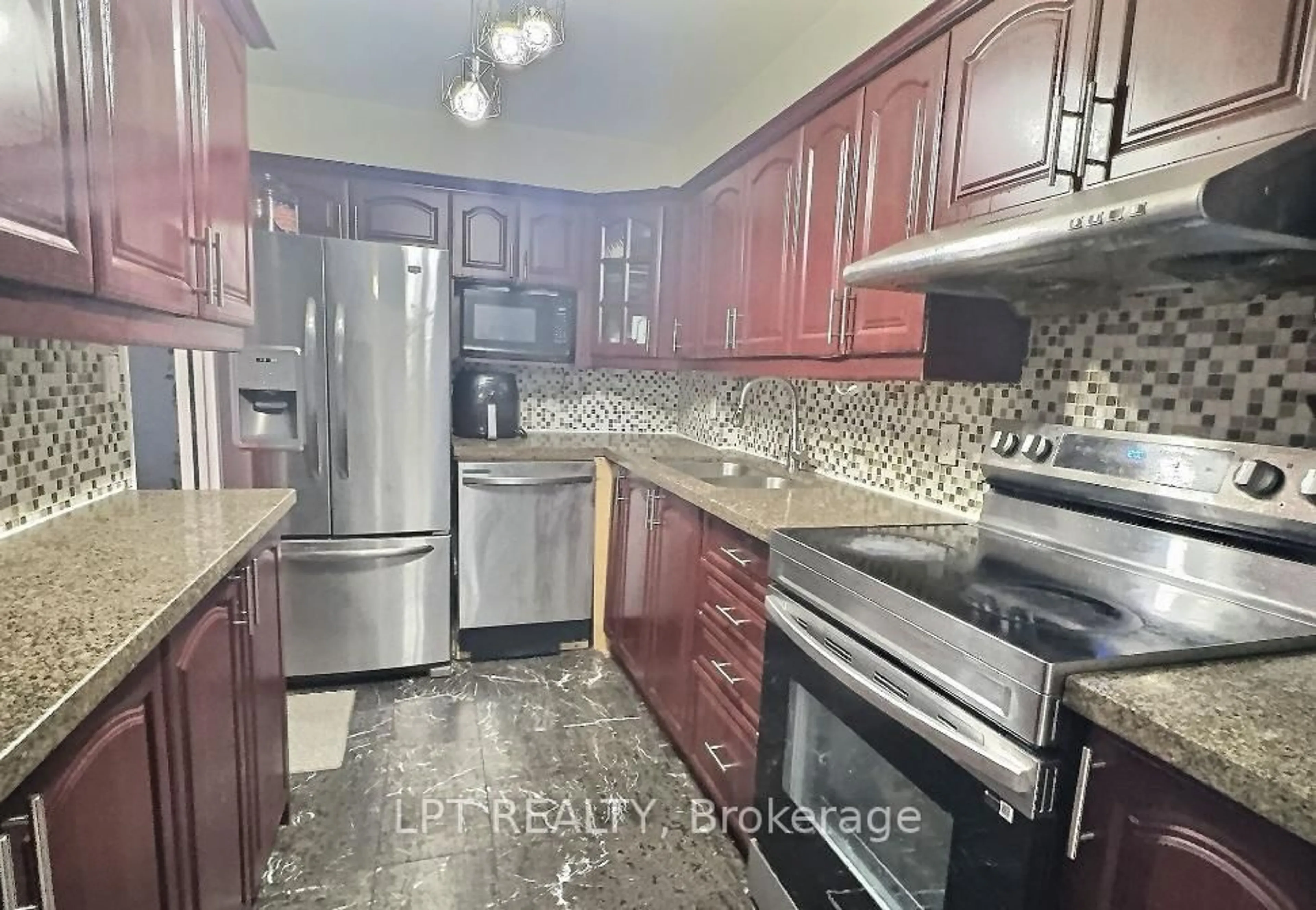 Standard kitchen, unknown for 1 Massey Sq #1202, Toronto Ontario M4C 5L4