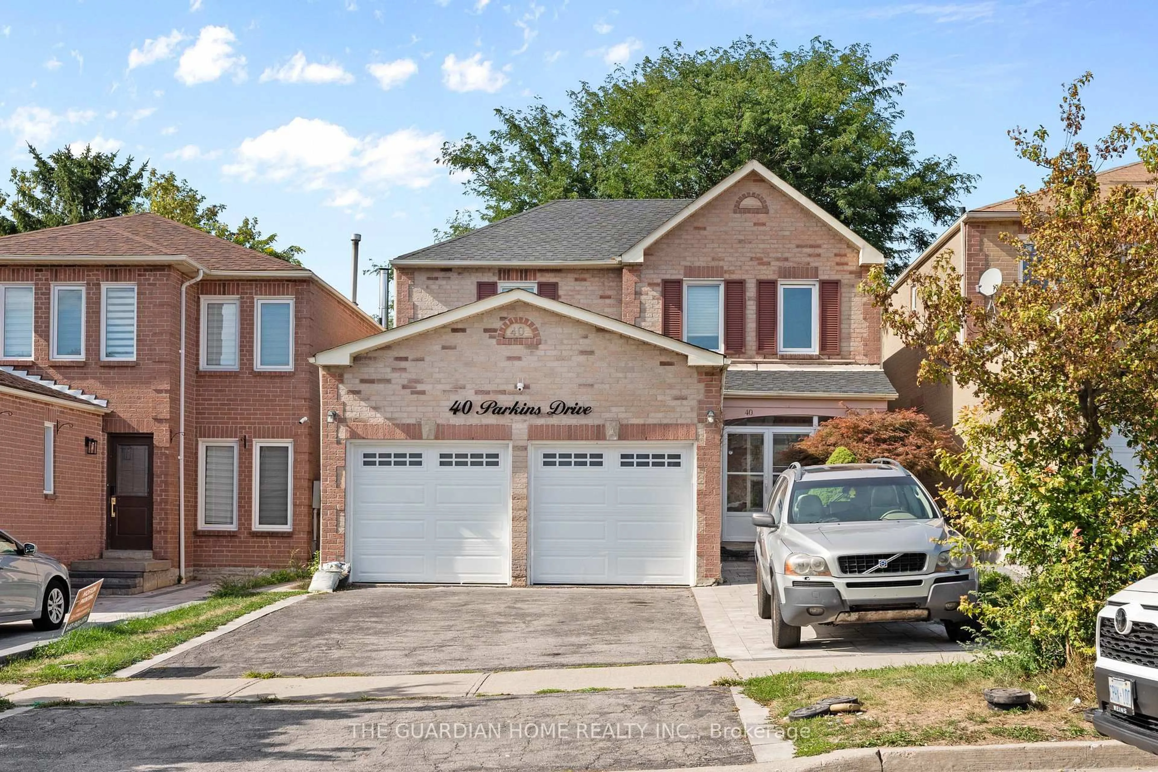 Home with brick exterior material, street for 40 Parkins Dr, Ajax Ontario L1T 3L2