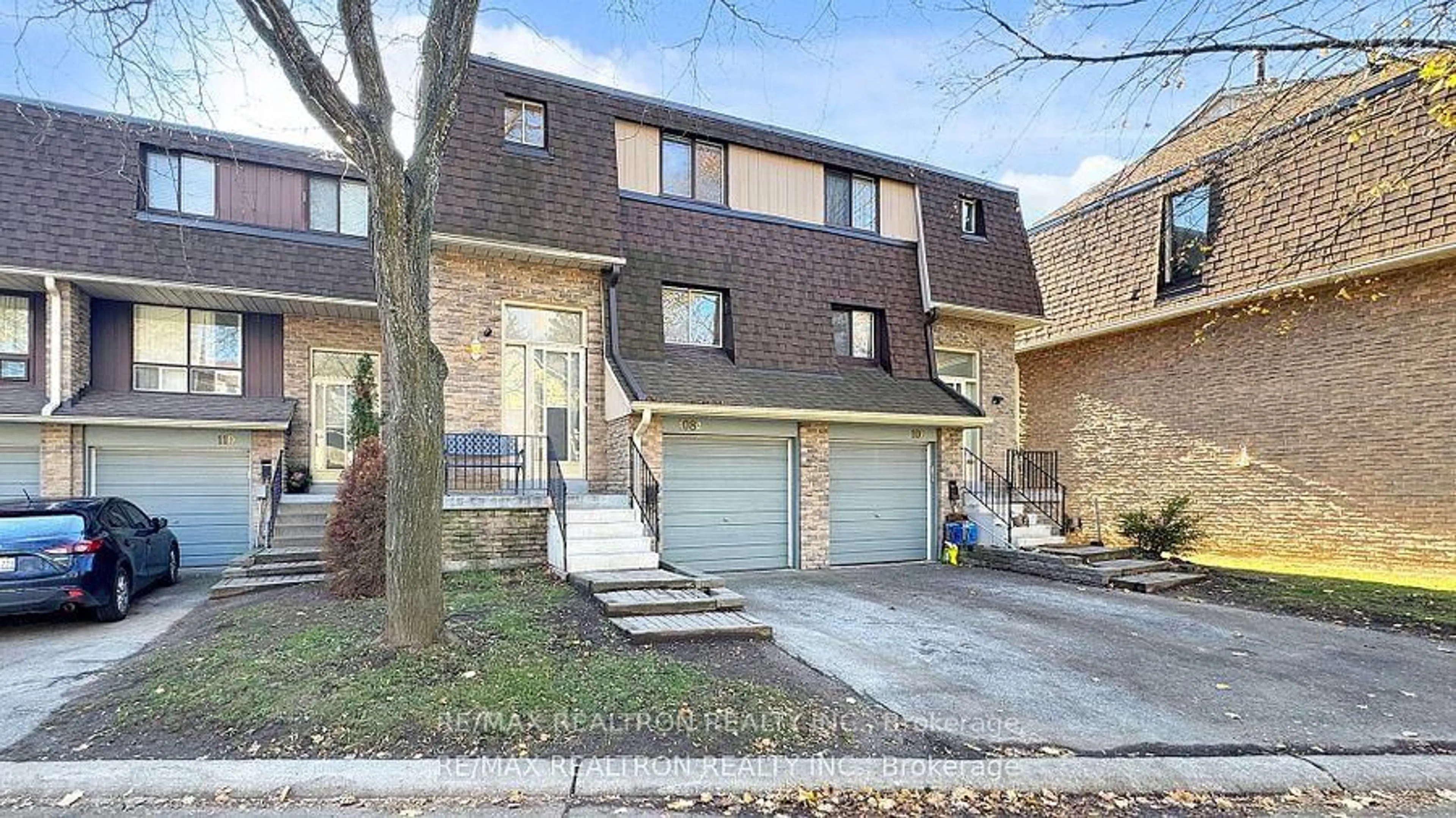 Home with brick exterior material, street for 371 Orton Park Rd #108, Toronto Ontario M1G 3V1