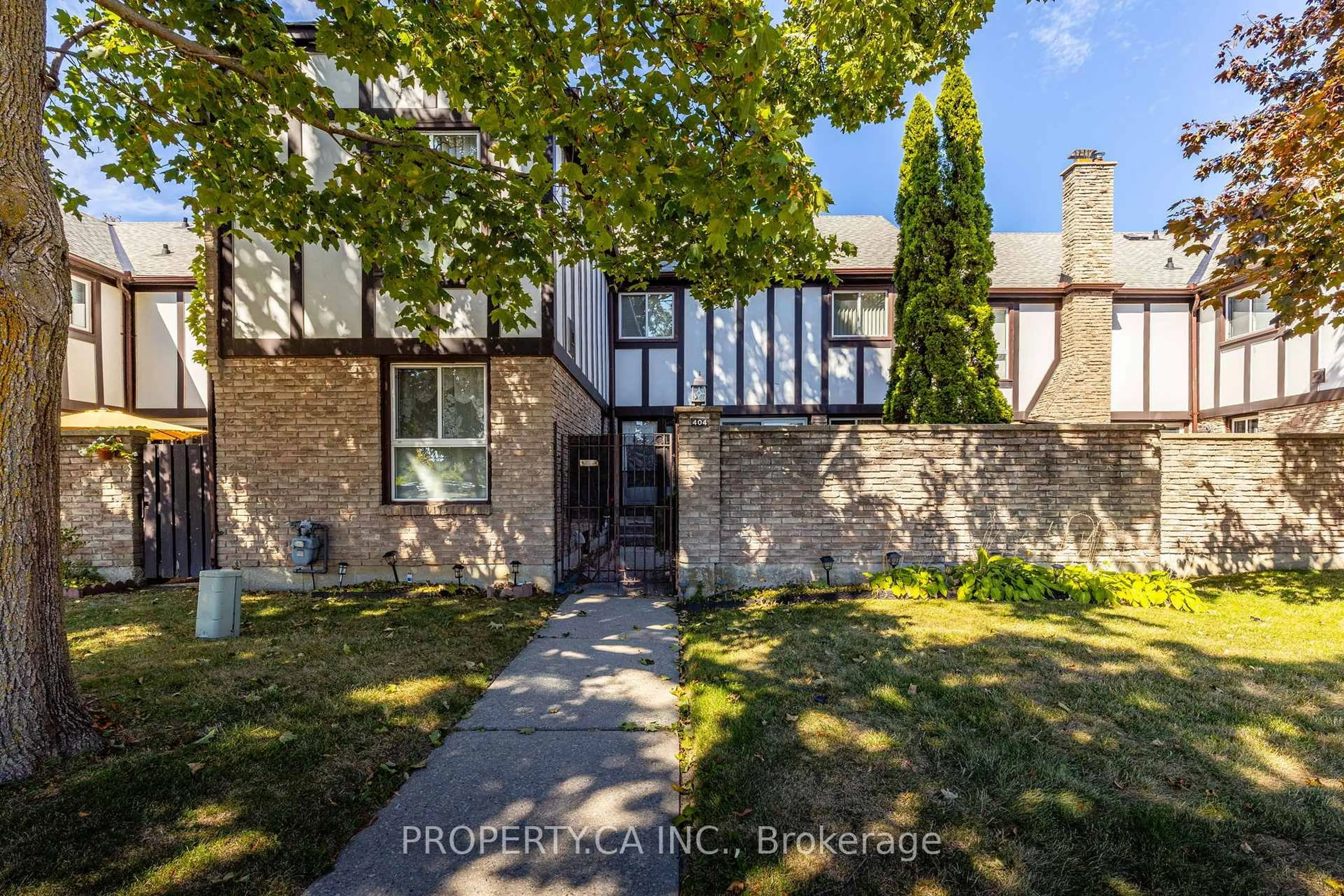 Home with brick exterior material, street for 404 Milner Ave, Toronto Ontario M1B 1Z9