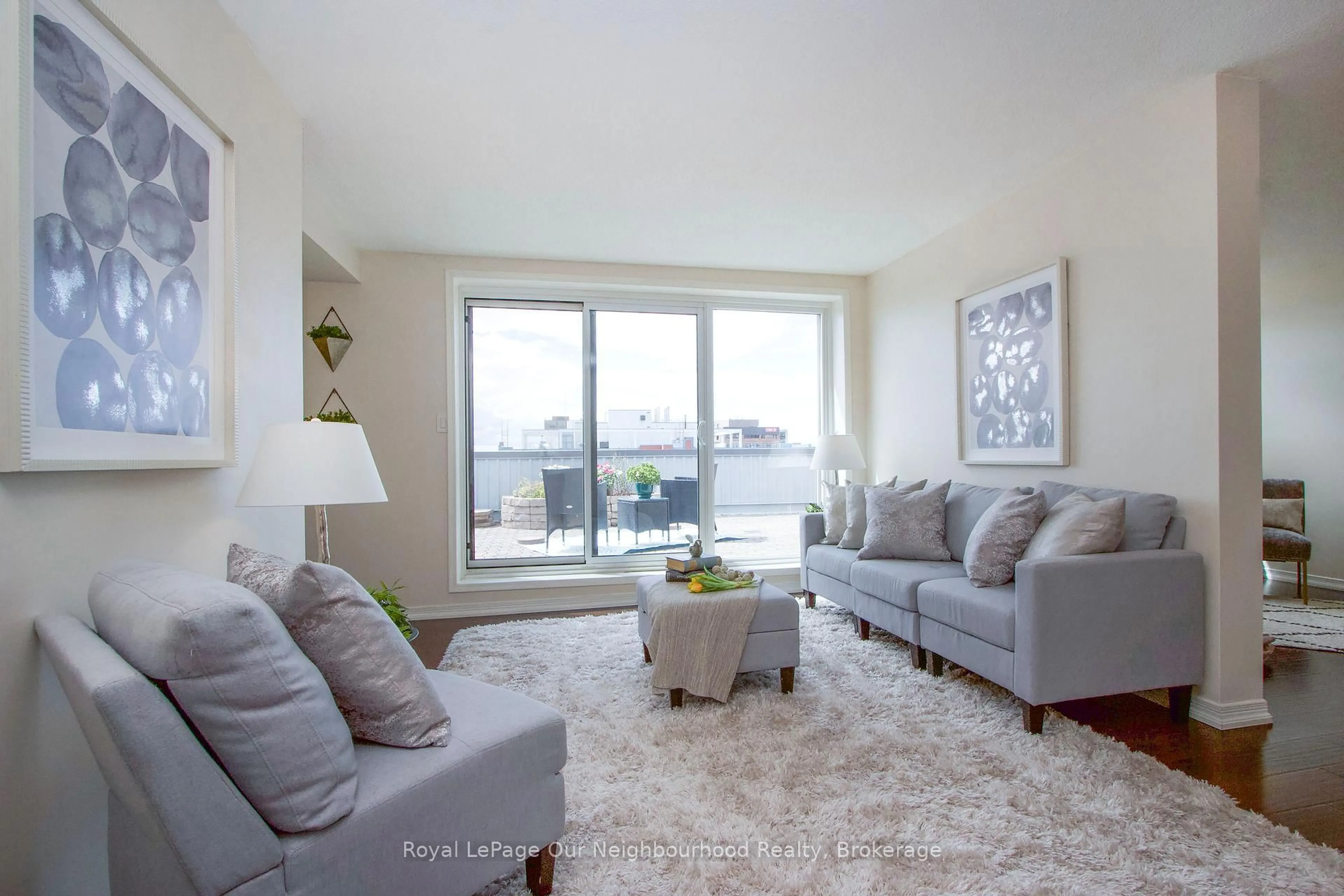 Living room with furniture, unknown for 80 Athol St #702, Oshawa Ontario L1H 8B7