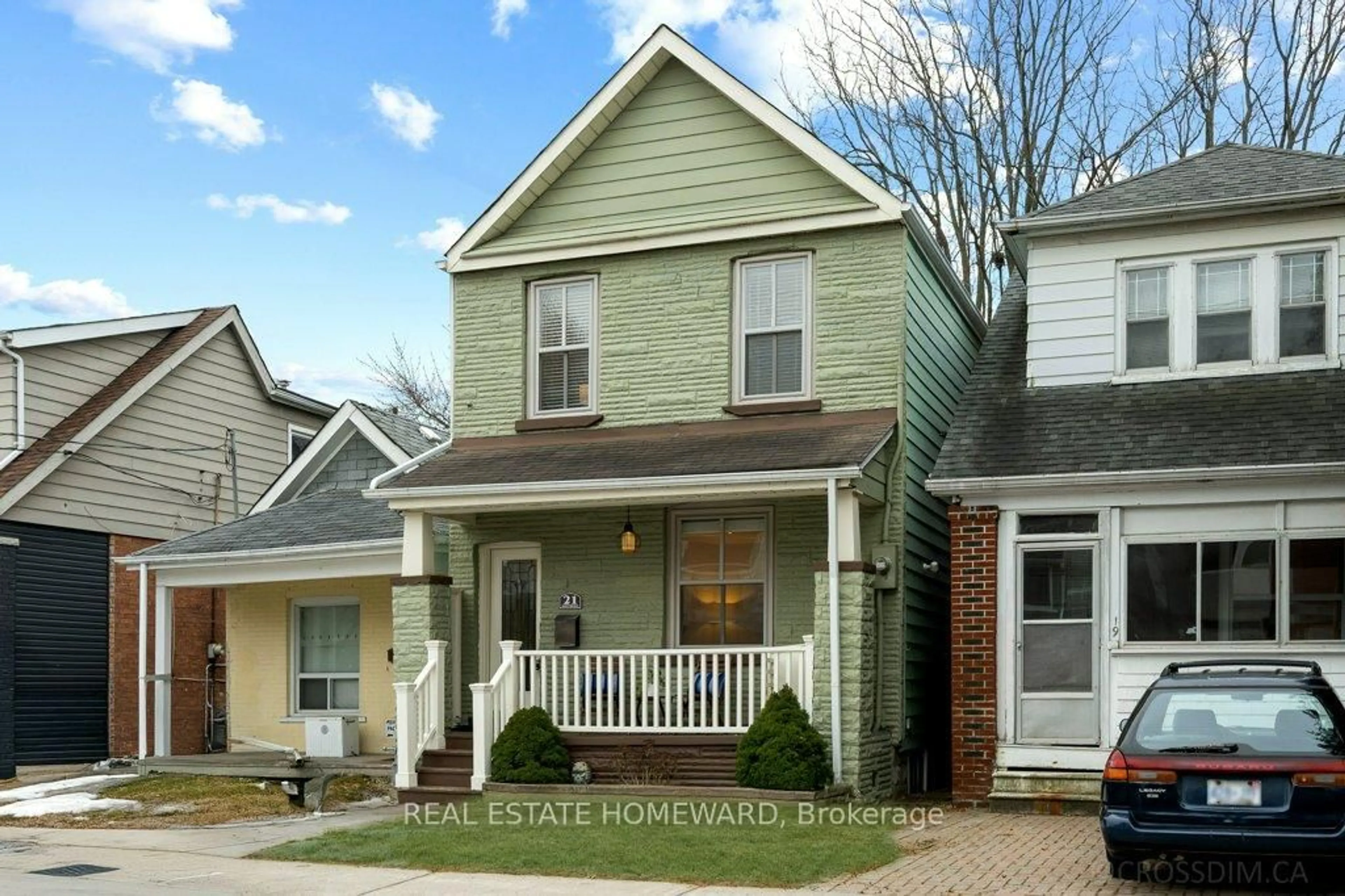 Home with vinyl exterior material, street for 21 Queensdale Ave, Toronto Ontario M4J 1Y1