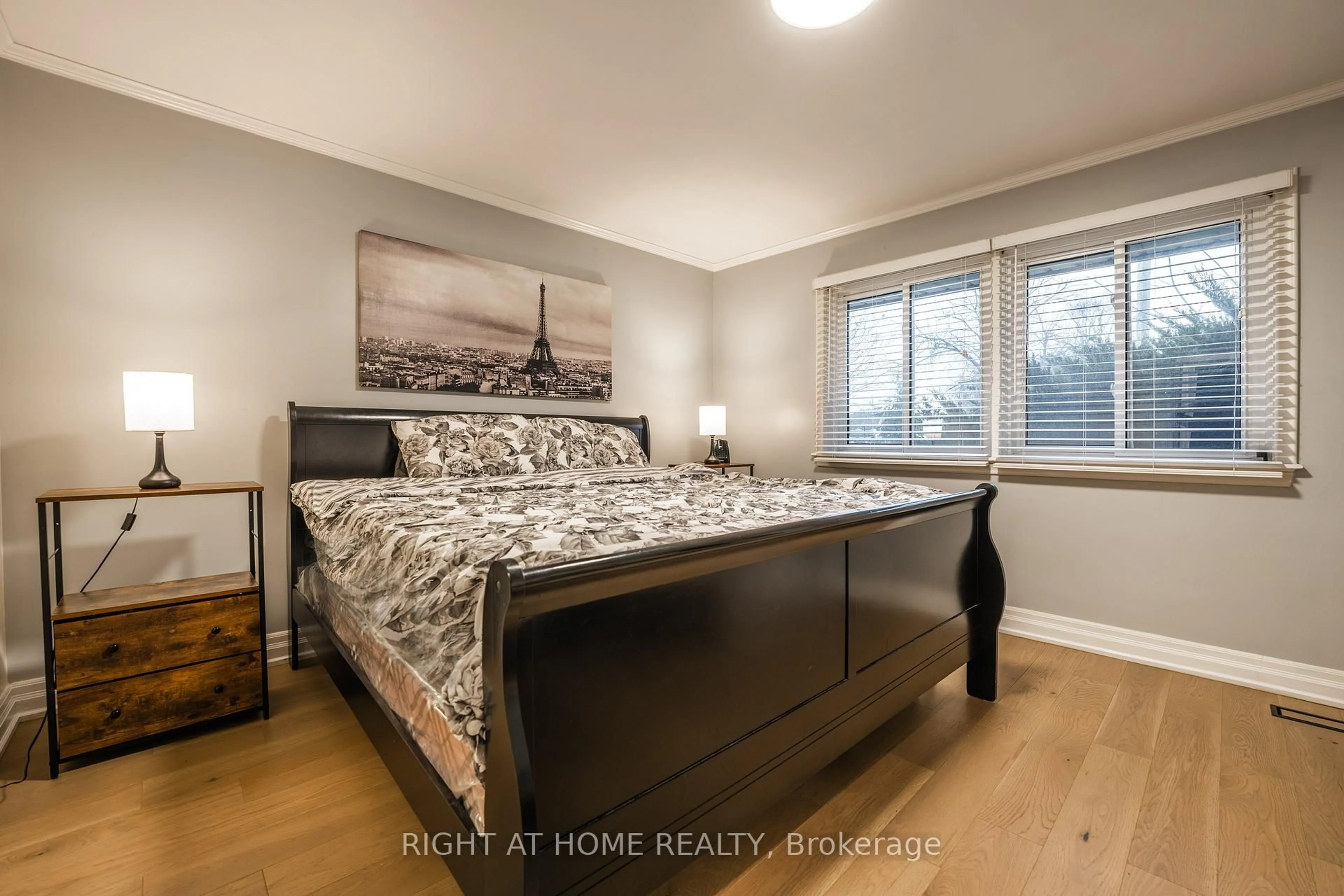 Bedroom with bed, wood/laminate floor for 201 Southlawn Ave, Oshawa Ontario L1H 3Y5