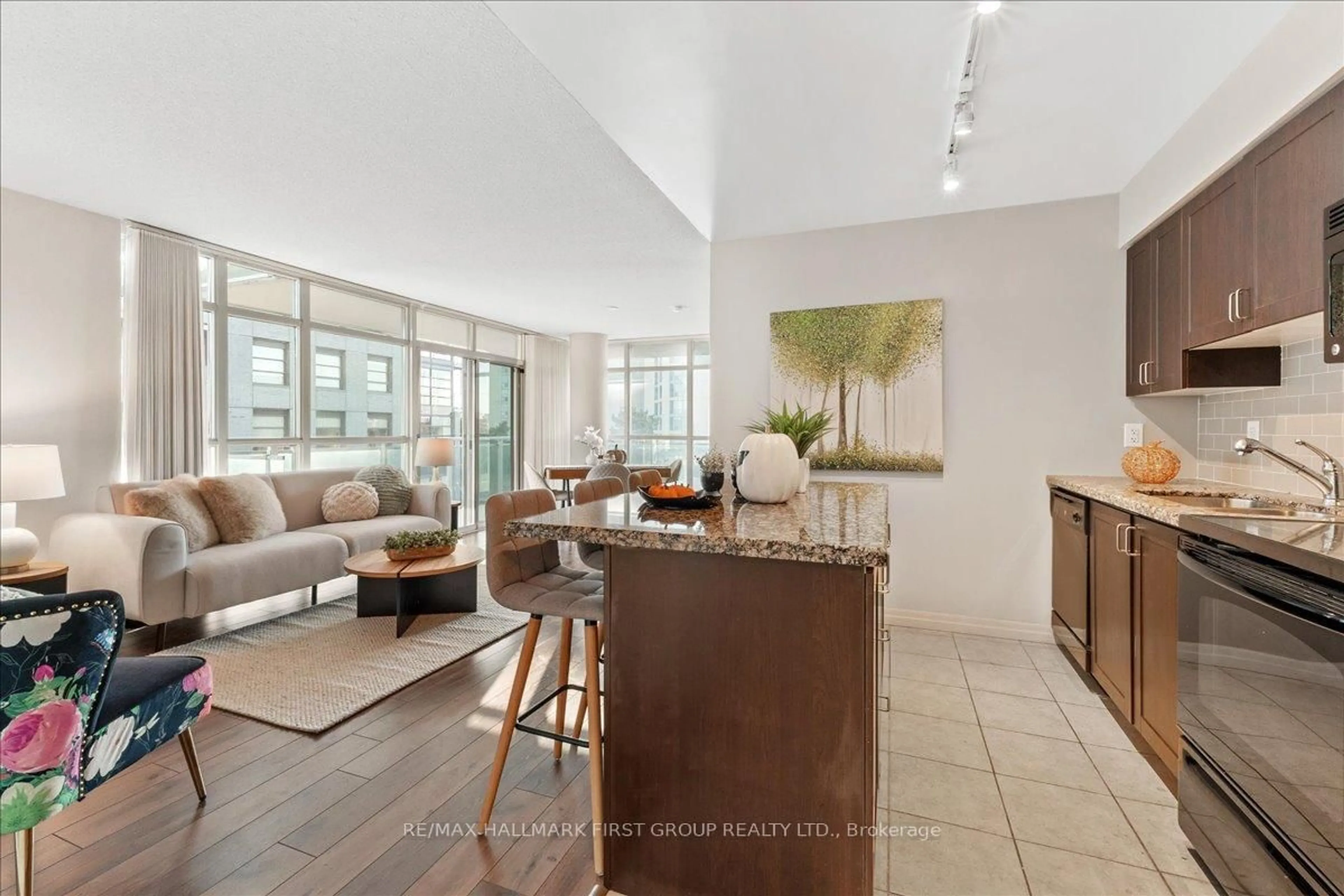 Living room with furniture, ceramic/tile floor for 1600 Charles St #303, Whitby Ontario L1N 0G4