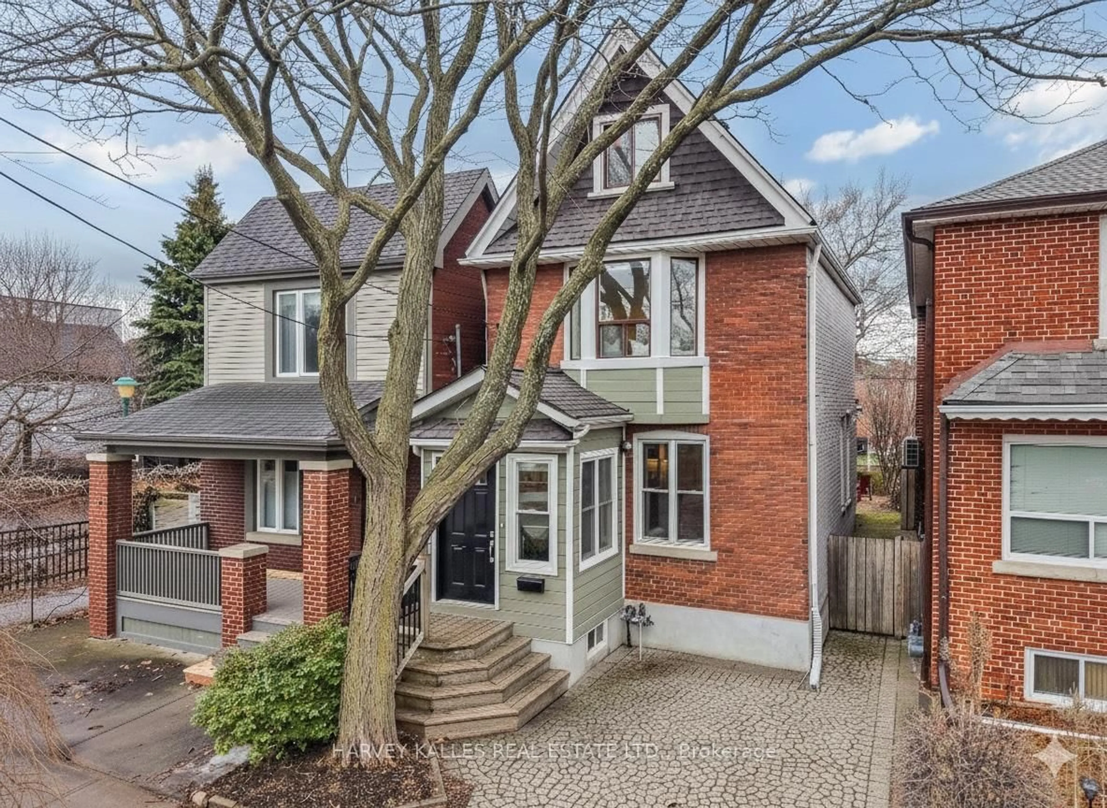 Home with brick exterior material, street for 153 Sammon Ave, Toronto Ontario M4J 1Y9