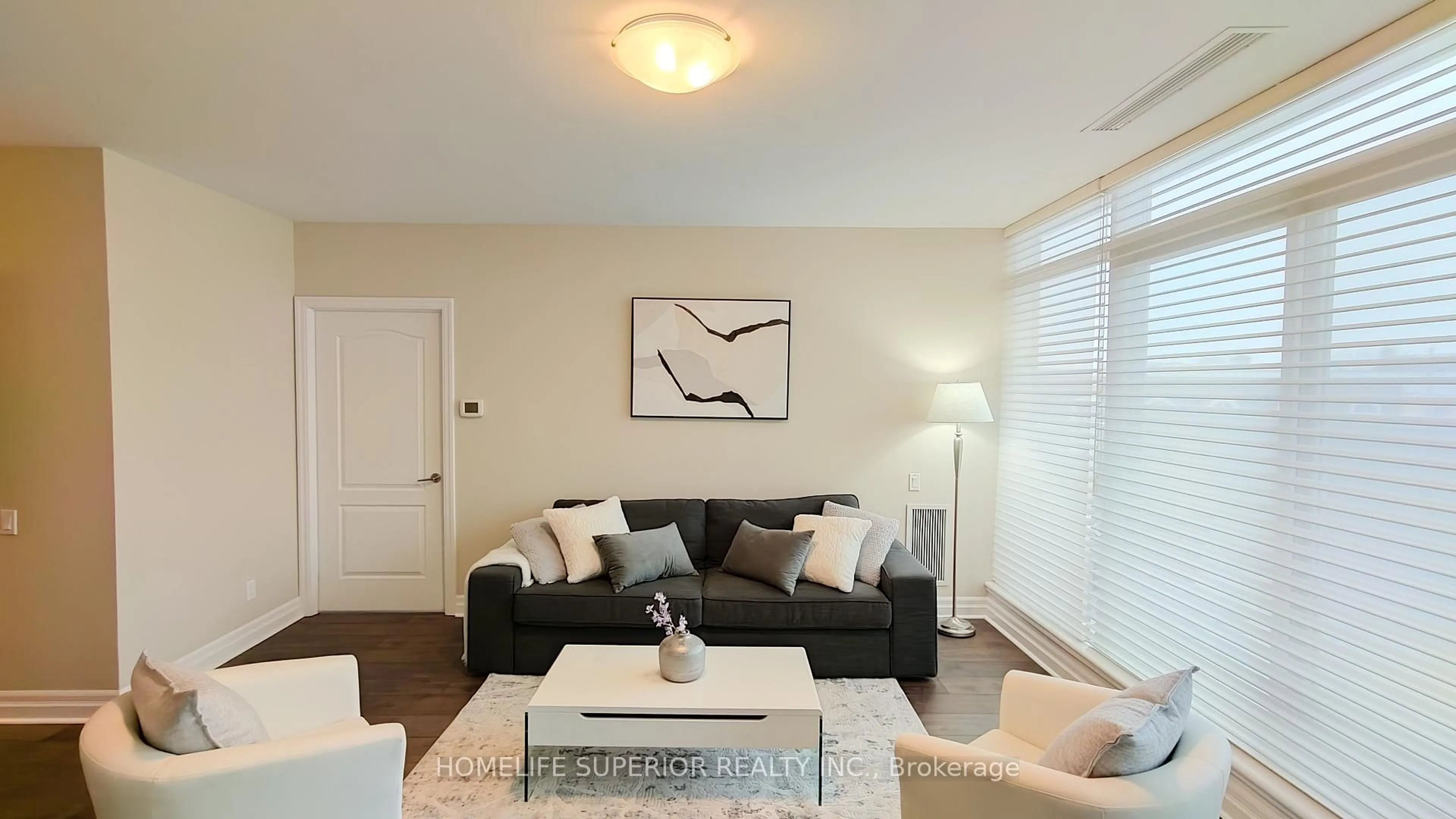 Living room with furniture, wood/laminate floor for 44 Bond St #316, Oshawa Ontario L1G 6R2