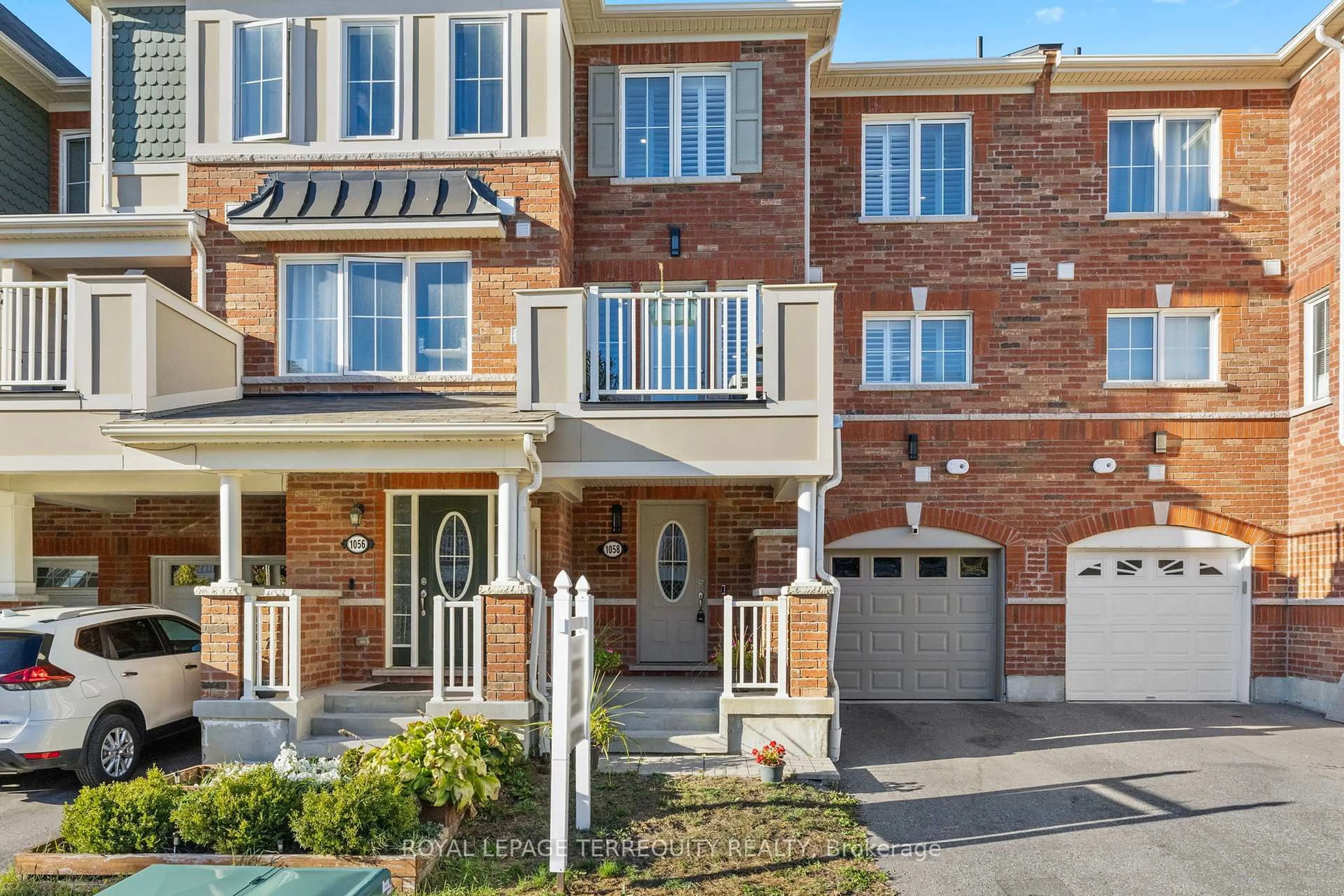 Home with brick exterior material, street for 1058 Clipper Lane, Pickering Ontario L1X 0E9