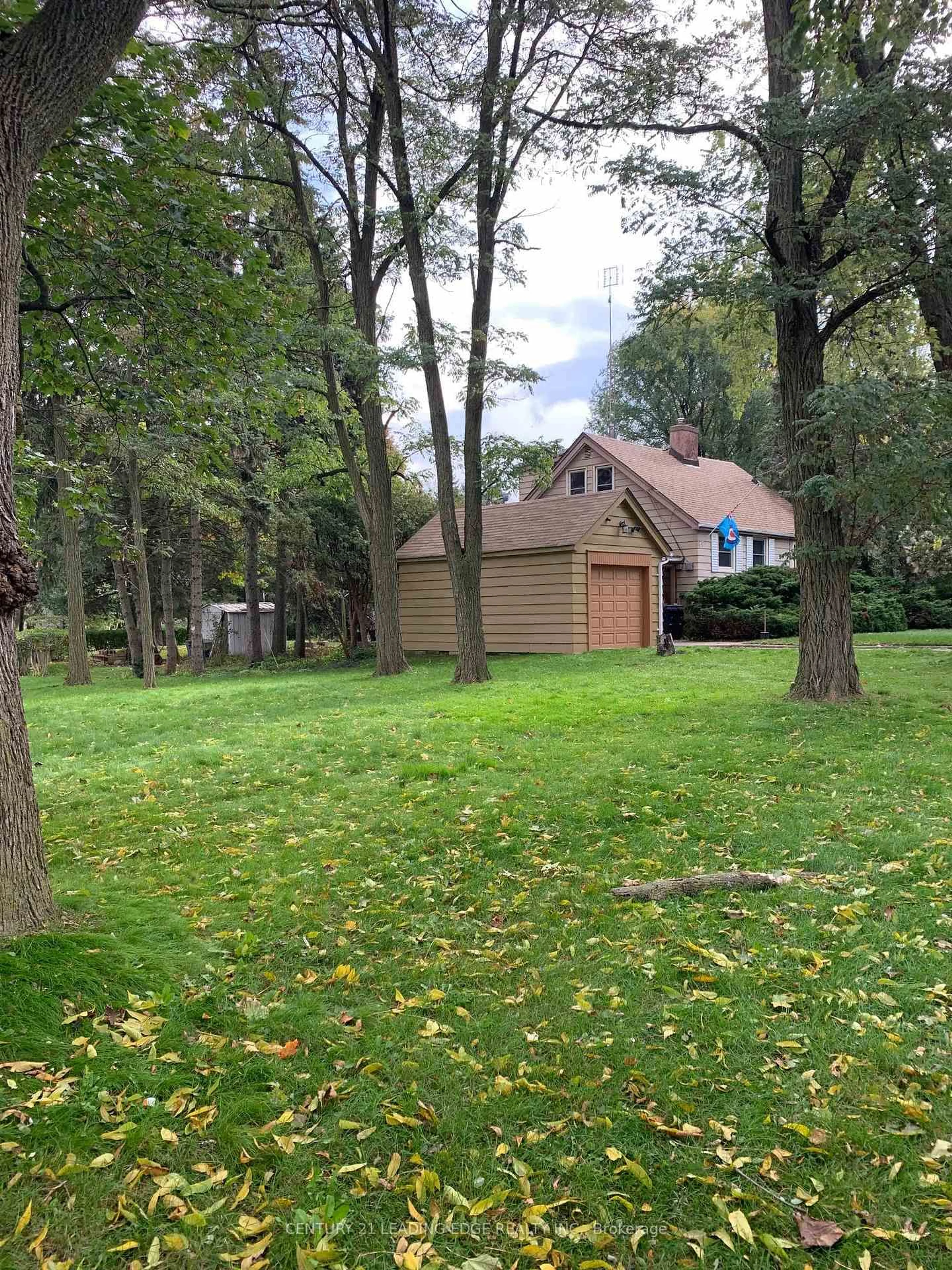 A pic from outside/outdoor area/front of a property/back of a property/a pic from drone, forest/trees view for 21 Faircroft Blvd, Toronto Ontario M1M 2W9