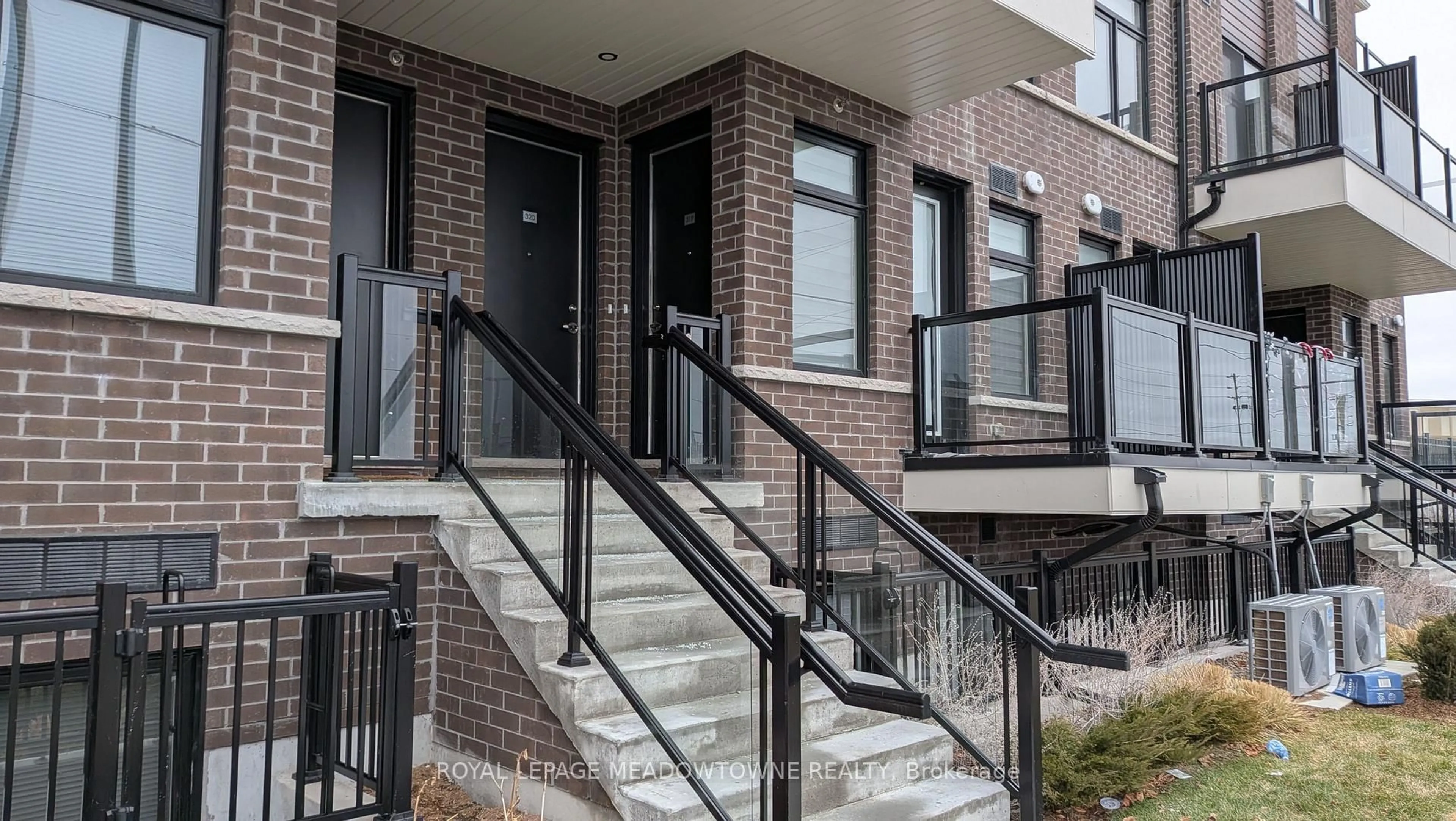 Home with brick exterior material, street for 755 Omega Dr #319, Pickering Ontario L1V 0H1