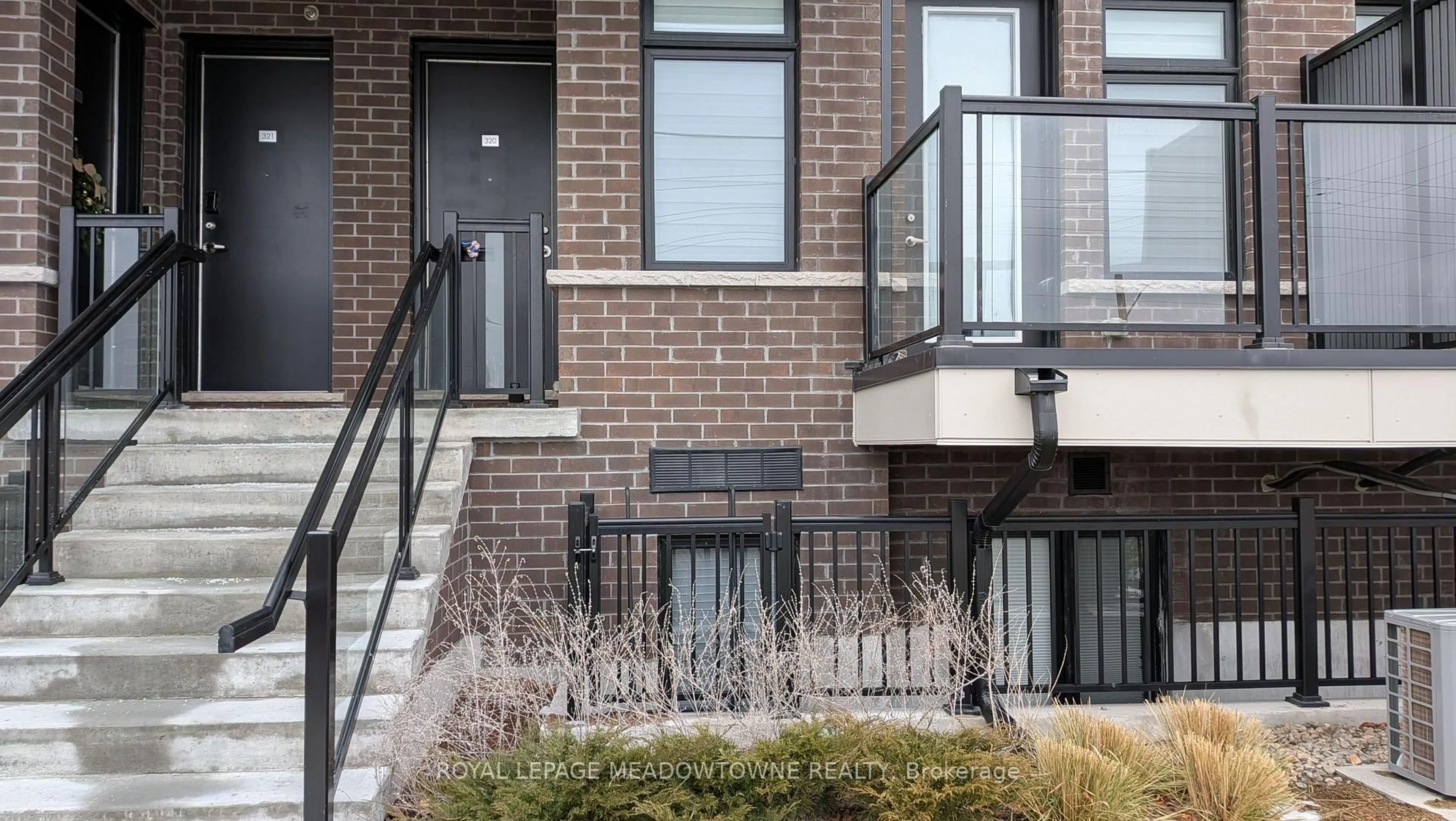 Home with brick exterior material, street for 755 Omega Dr #319, Pickering Ontario L1V 0H1