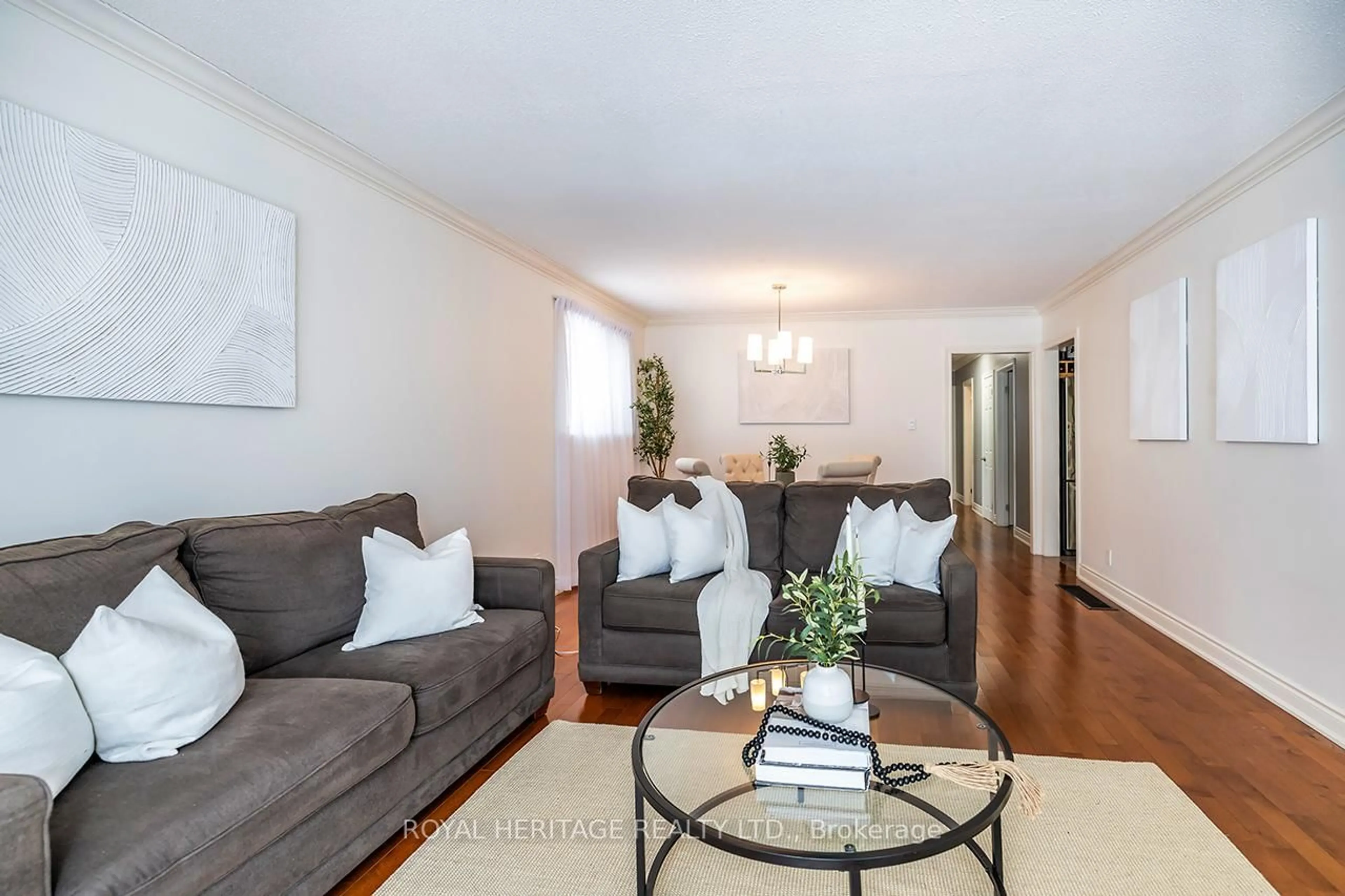 Living room with furniture, wood/laminate floor for 803 Oliva St, Pickering Ontario L1W 2V9