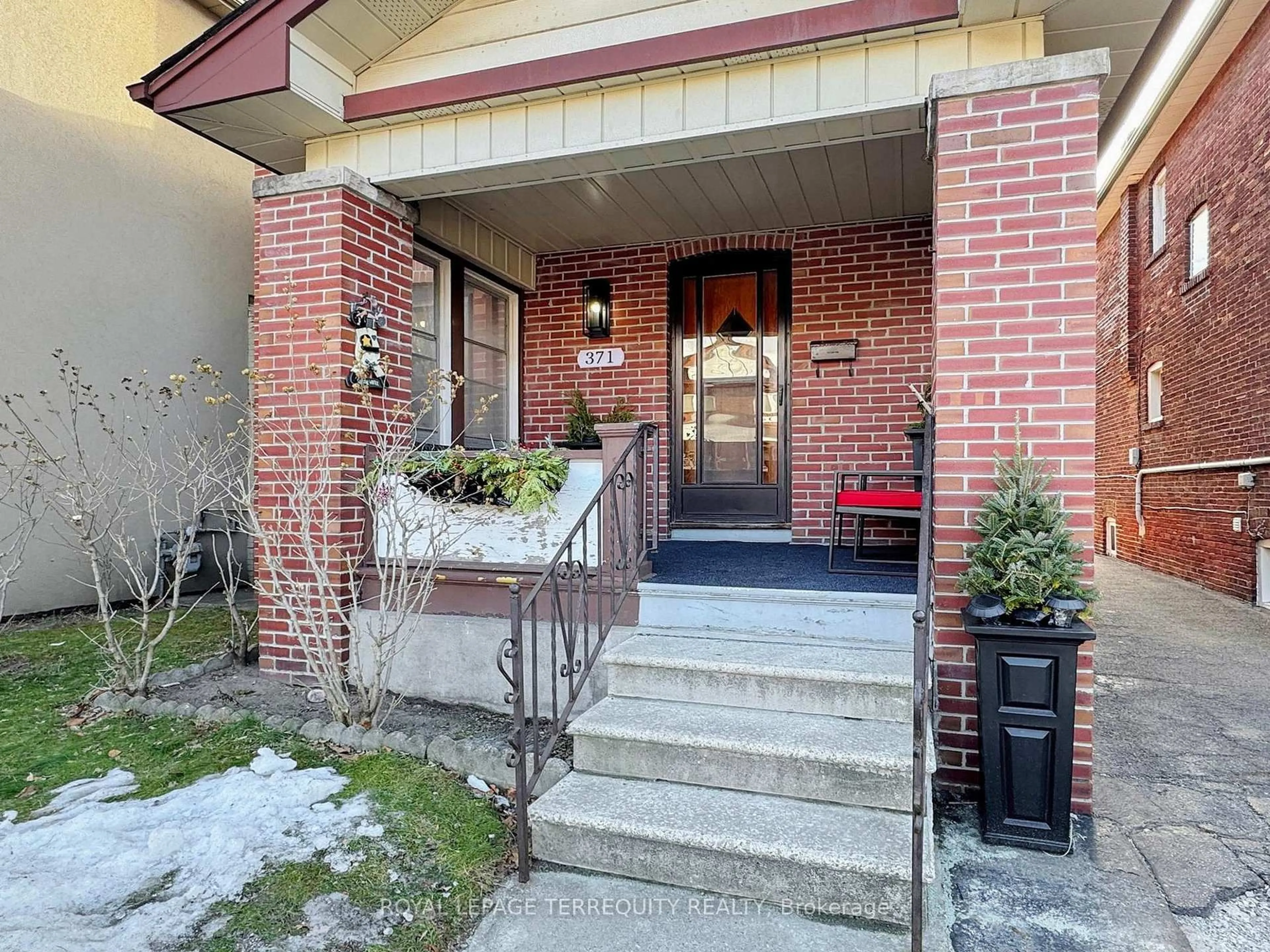 Home with brick exterior material, street for 371 Strathmore Blvd, Toronto Ontario M4C 1N4