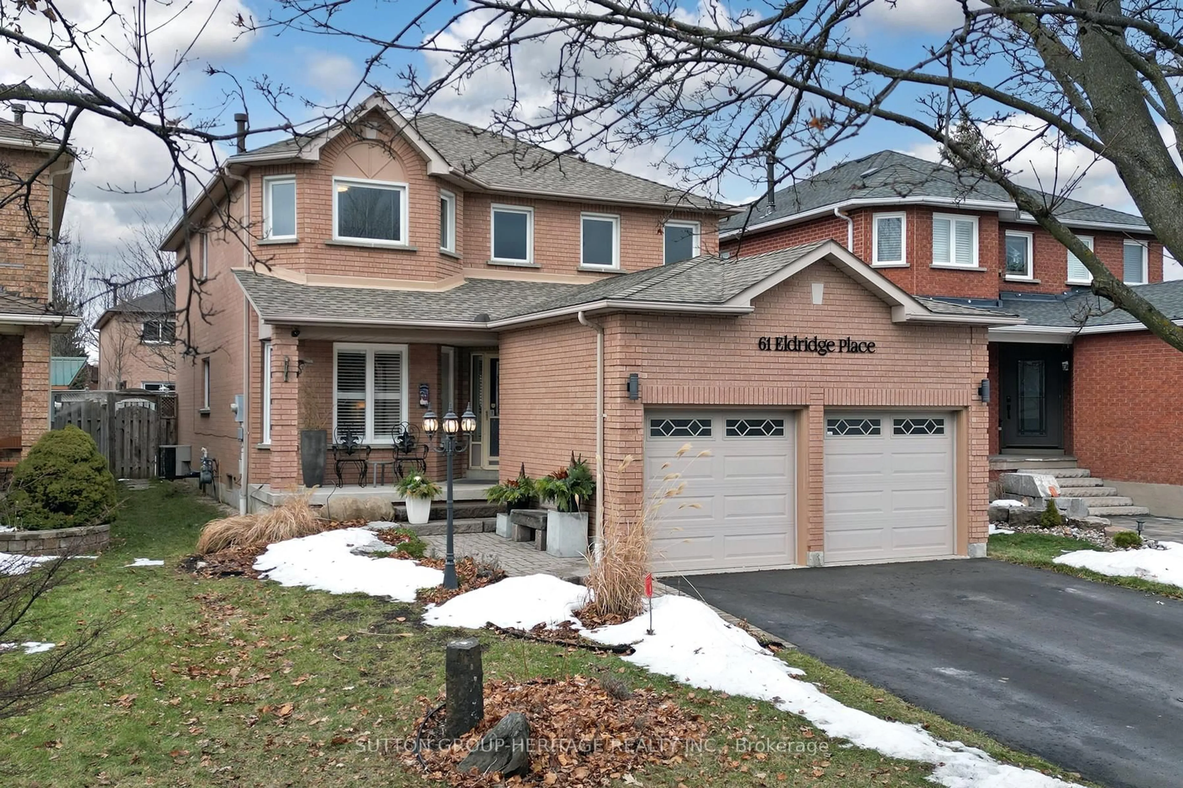 Home with brick exterior material, street for 61 Eldridge Pl, Whitby Ontario L1N 9E5