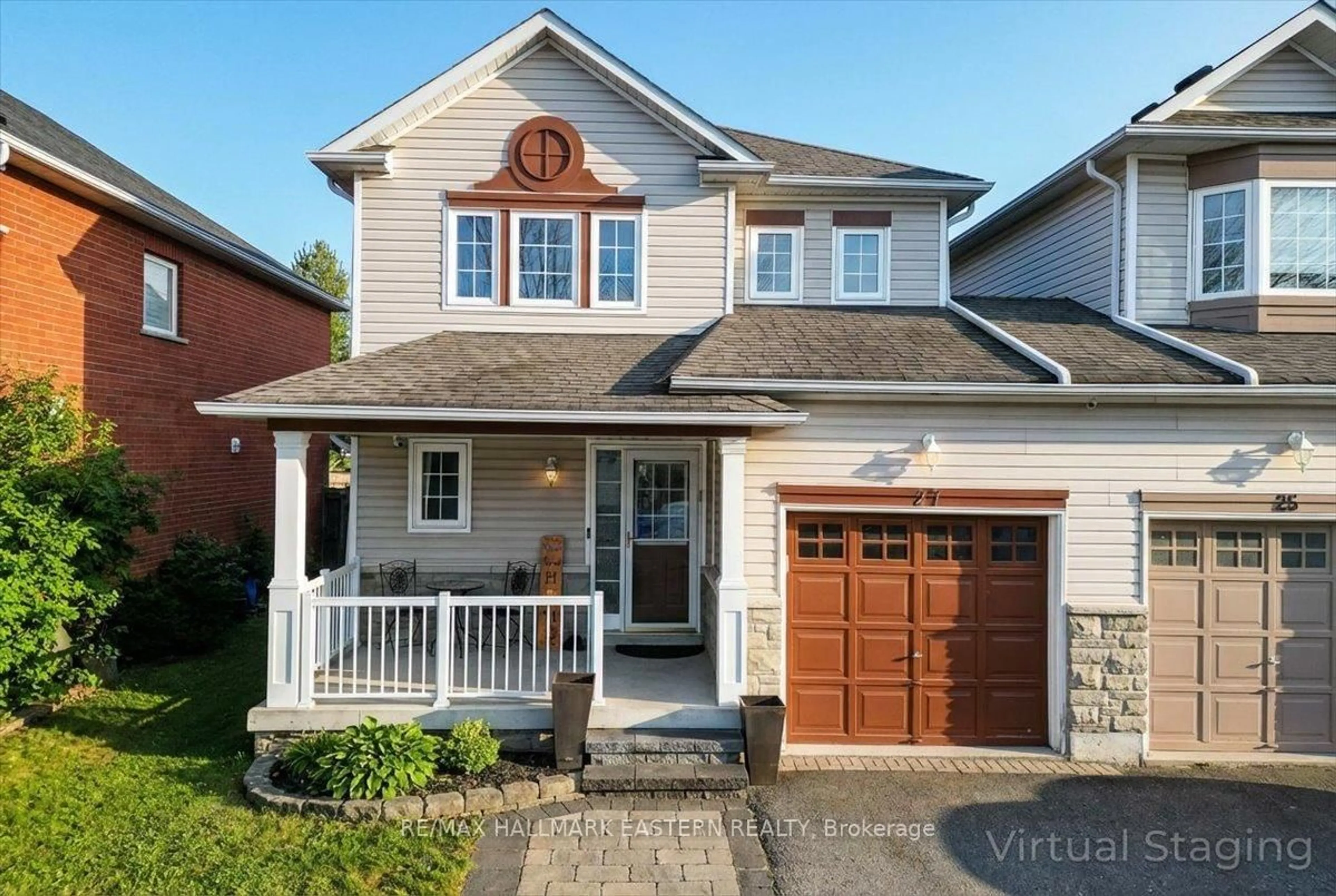 Home with vinyl exterior material, street for 27 Primeau Ave, Whitby Ontario L1M 2B7