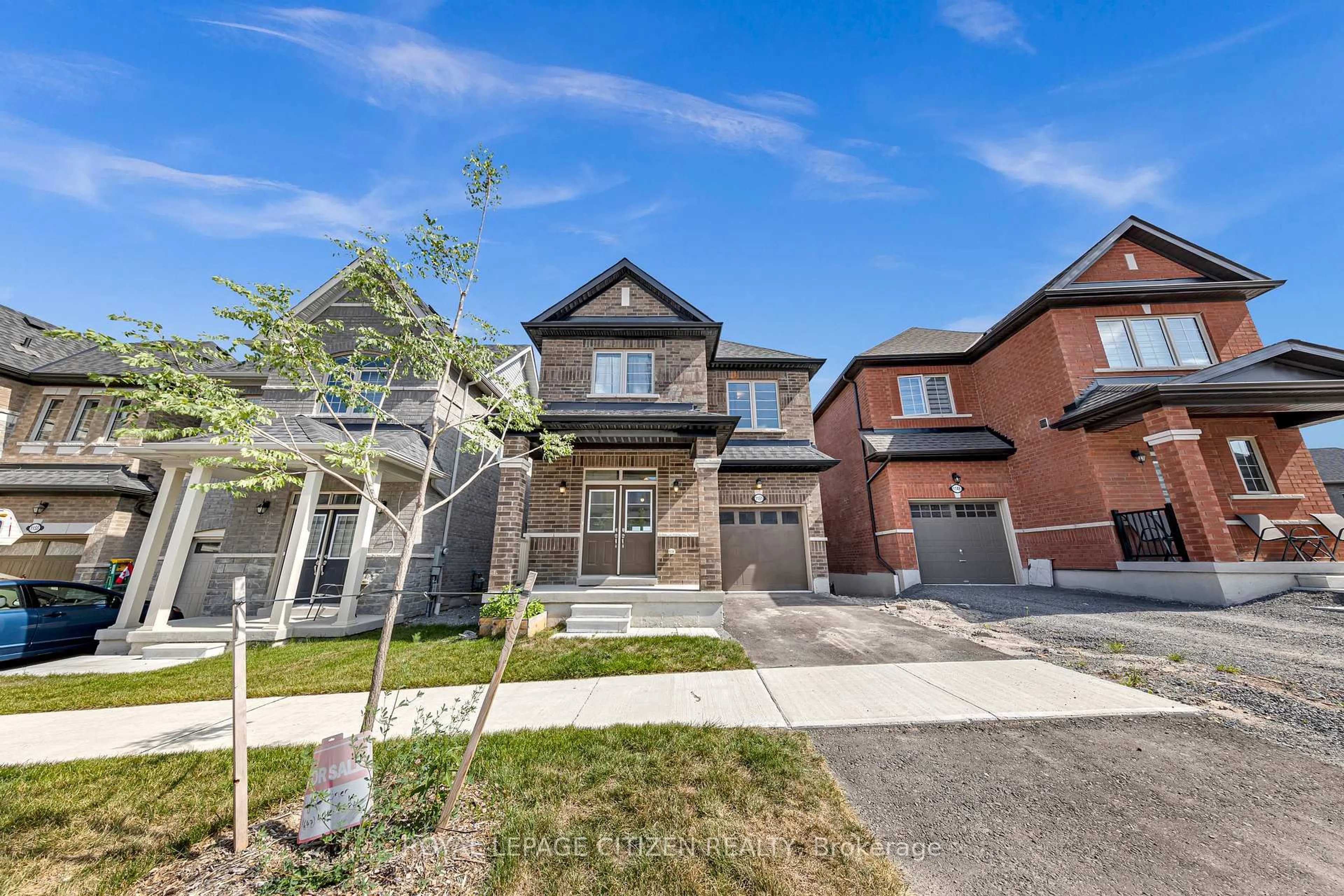 Home with brick exterior material, street for 1151 Skyridge Blvd, Pickering Ontario L1X 0M4