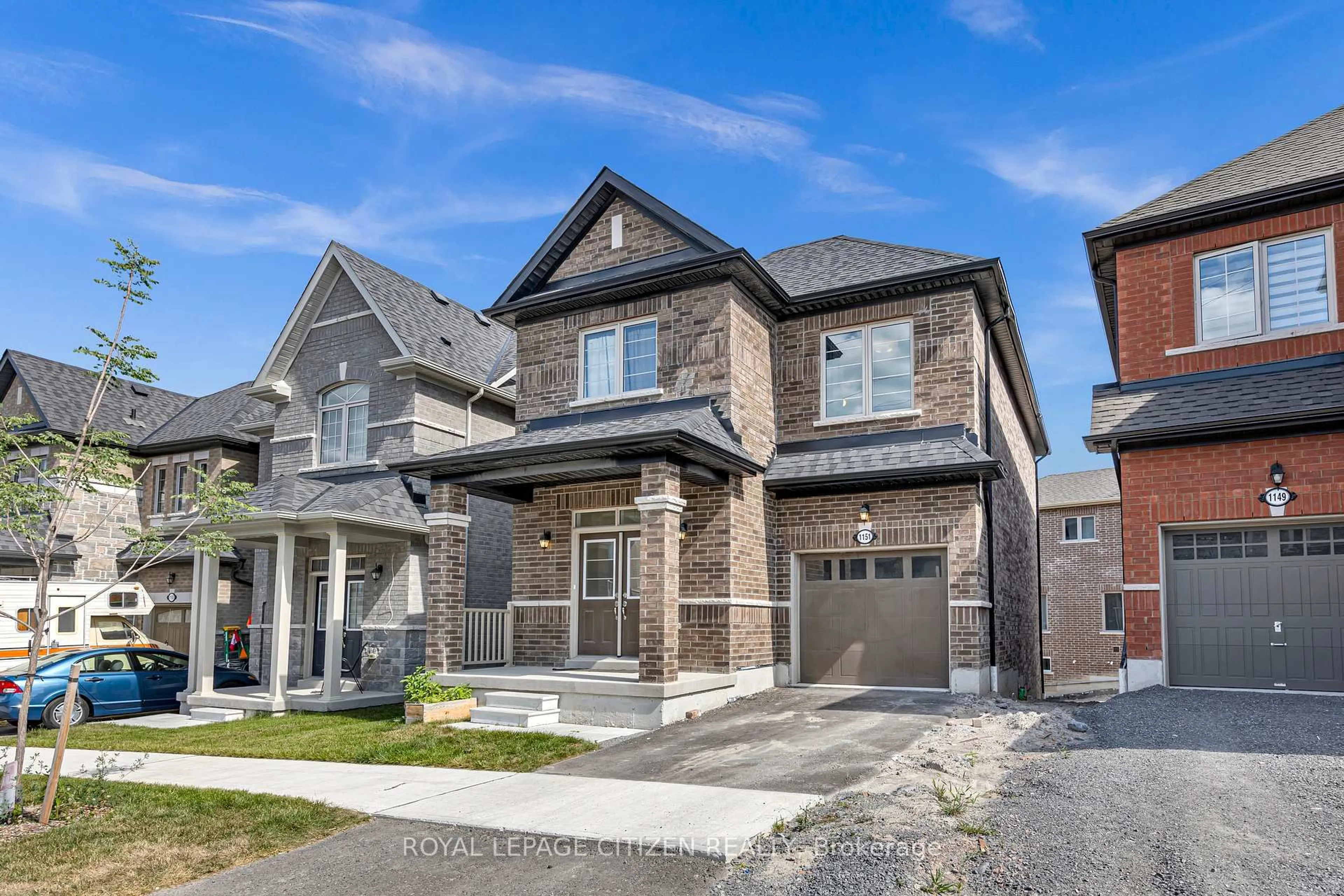 Home with brick exterior material, street for 1151 Skyridge Blvd, Pickering Ontario L1X 0M4