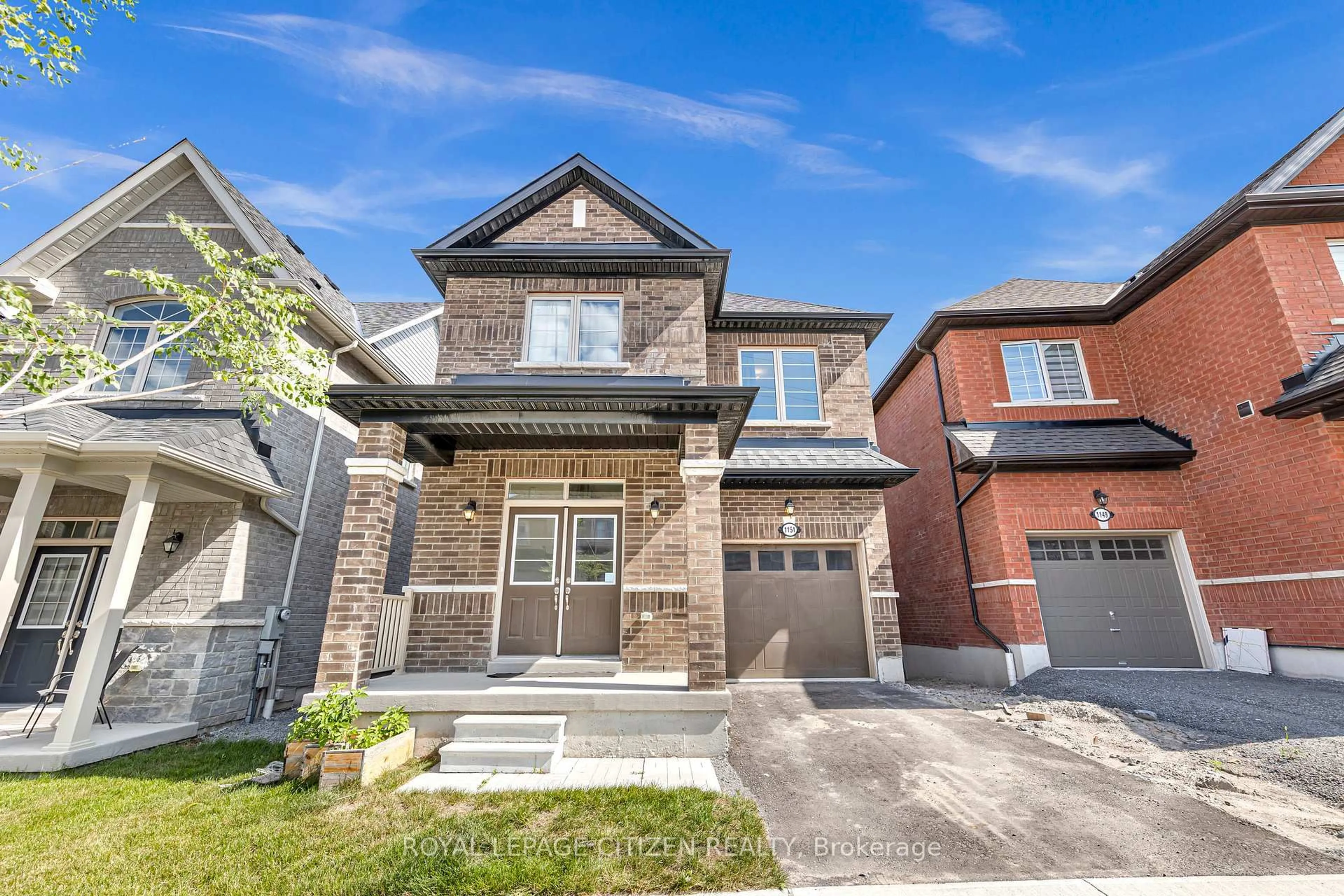 Home with brick exterior material, street for 1151 Skyridge Blvd, Pickering Ontario L1X 0M4