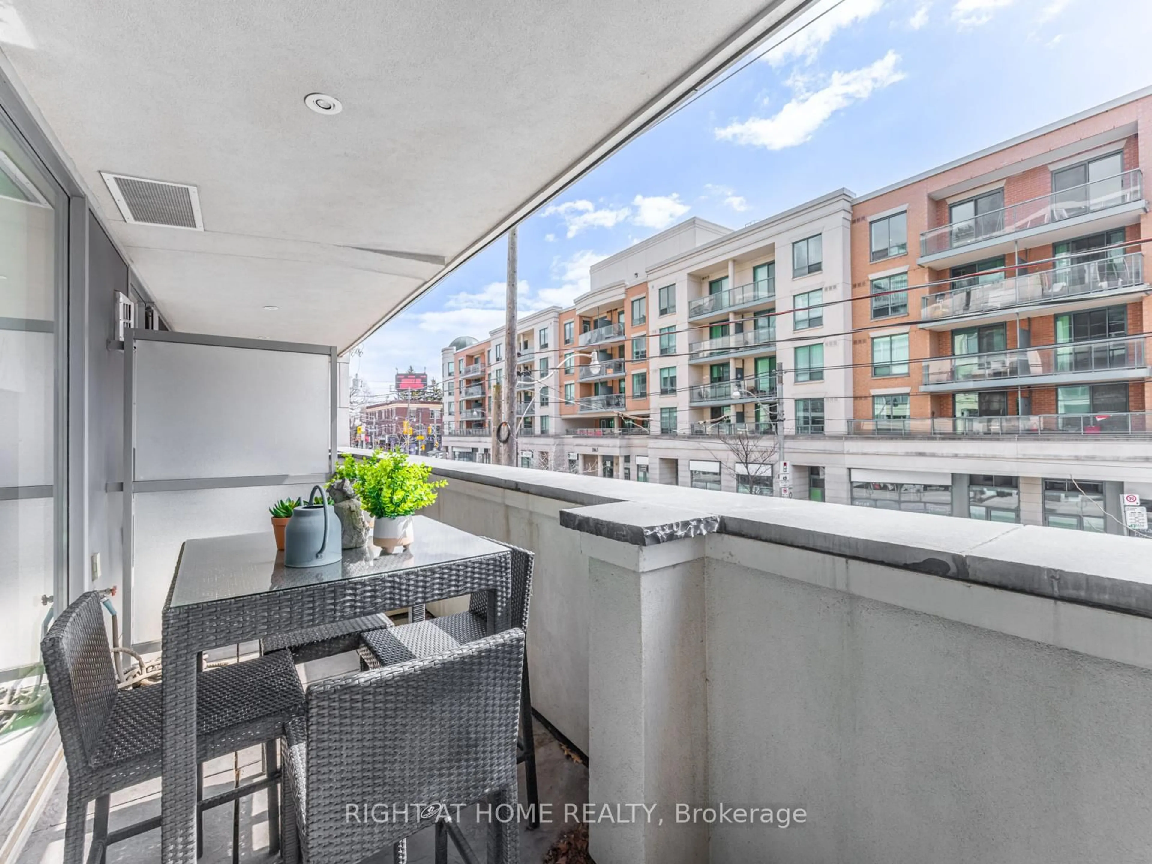 Balcony in the apartment, city buildings view from balcony for 1 Rainsford Rd #204, Toronto Ontario M4L 3N5