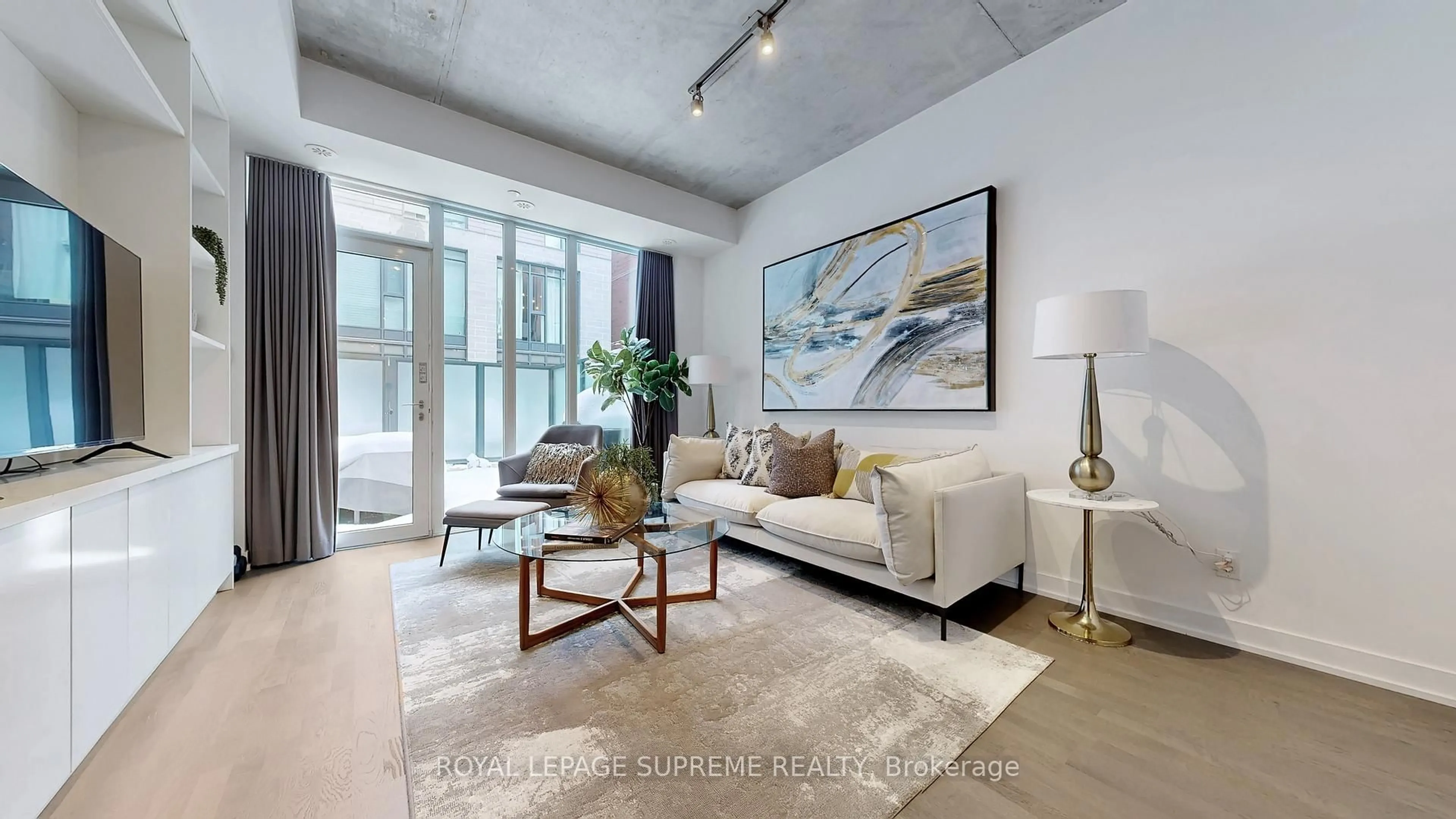 Living room with furniture, unknown for 1246 Dundas St, Toronto Ontario M4M 1S3