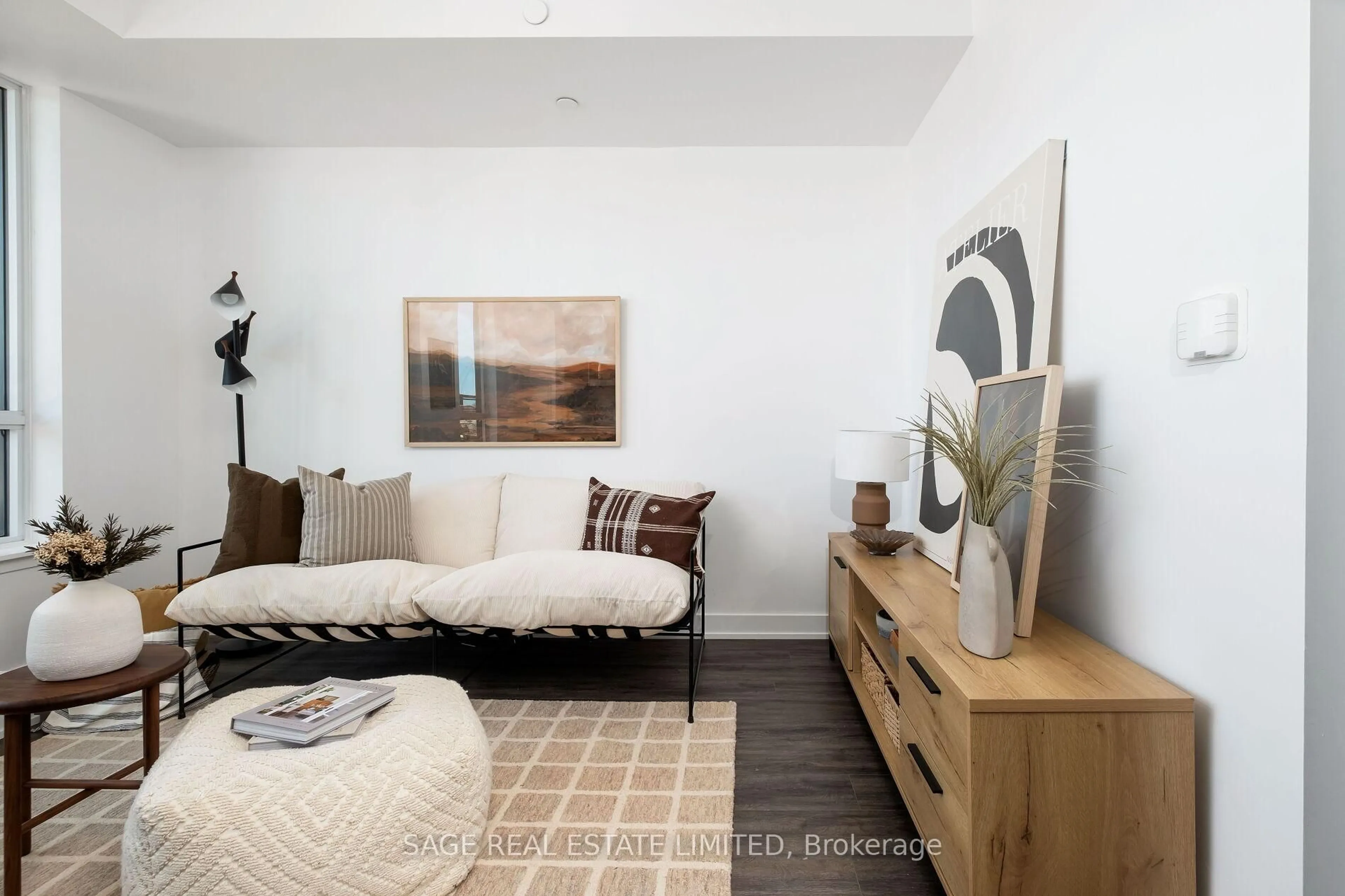 Living room with furniture, wood/laminate floor for 630 Greenwood Ave #501, Toronto Ontario M4J 4B2