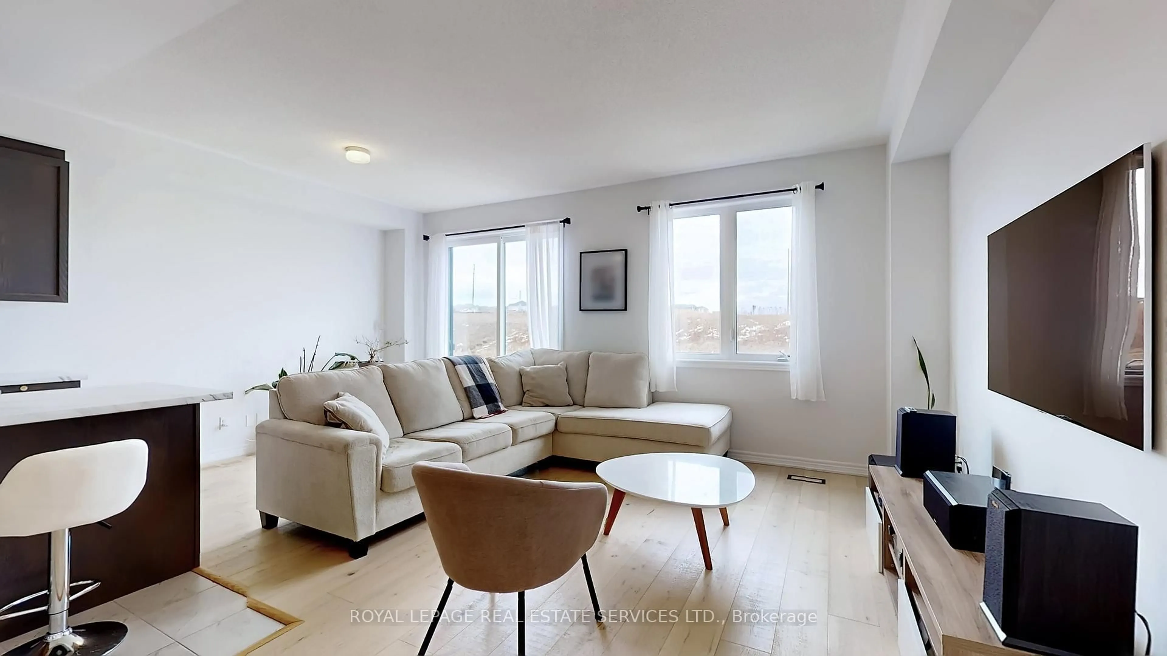 Living room with furniture, wood/laminate floor for 1068 Lockie Dr, Oshawa Ontario L1L 0R9