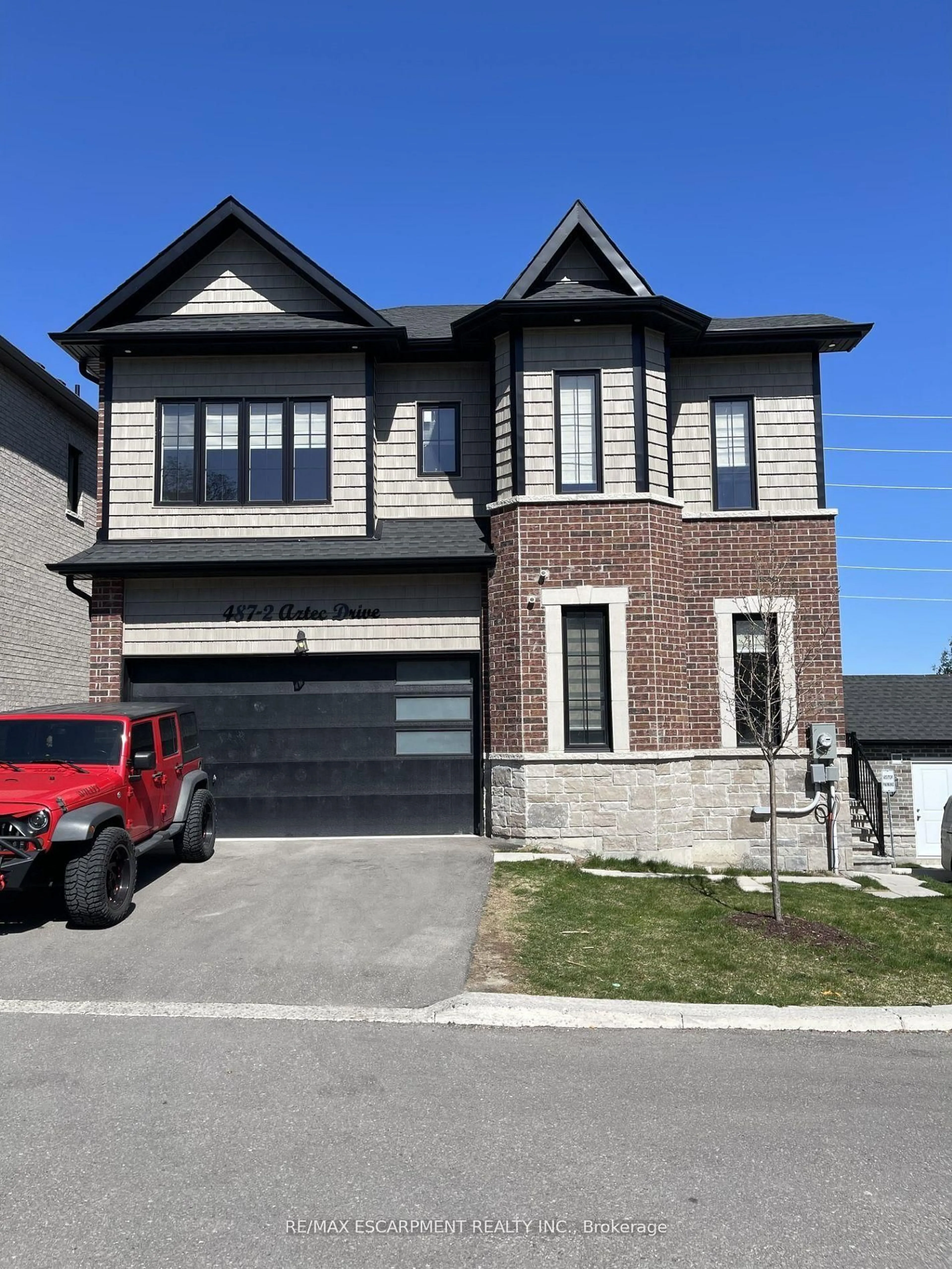 Home with brick exterior material, street for 487 Aztec Dr #2, Oshawa Ontario L1J 7S7