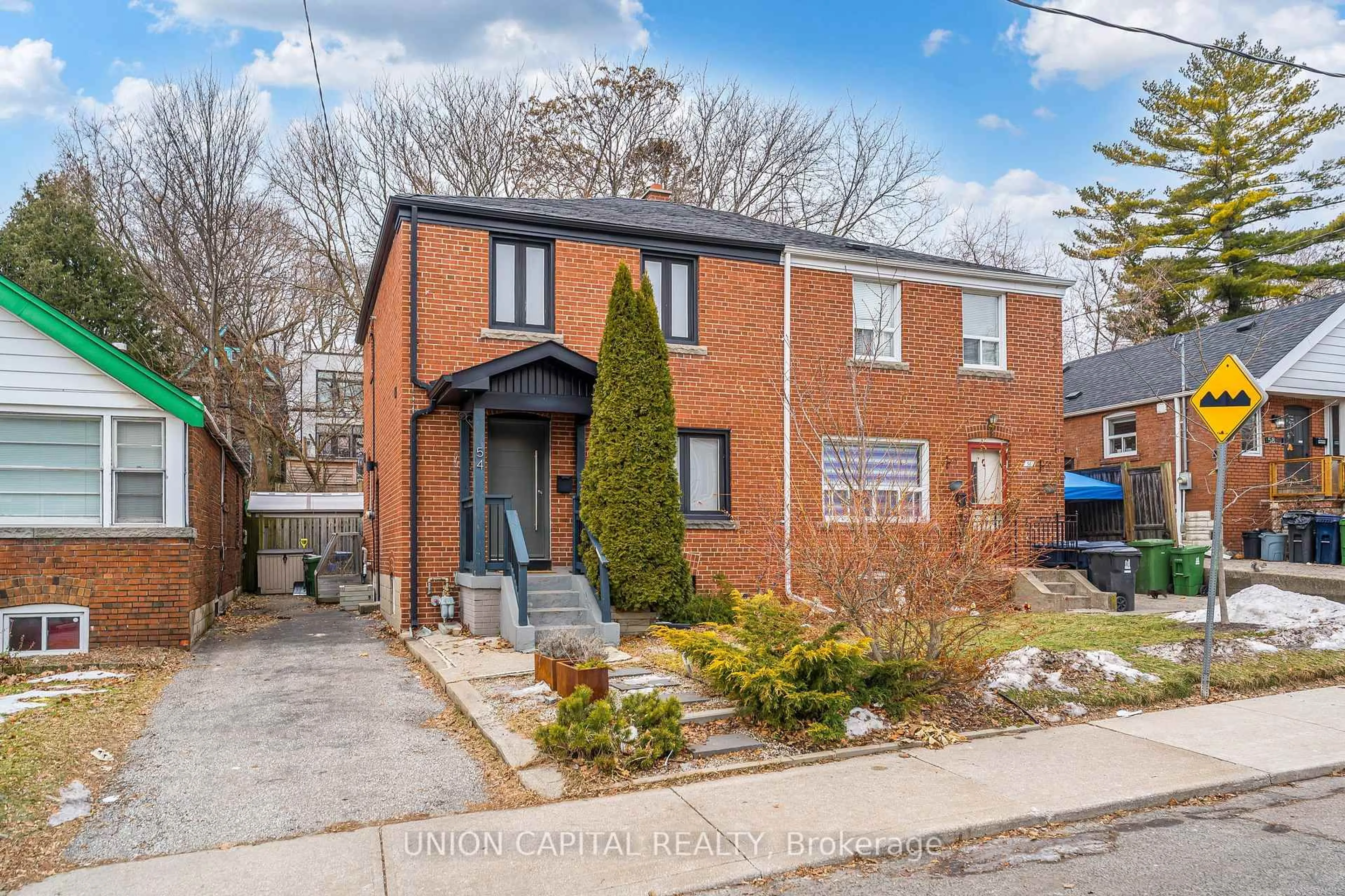Home with brick exterior material, street for 54 Glenside Ave, Toronto Ontario M4L 2T5