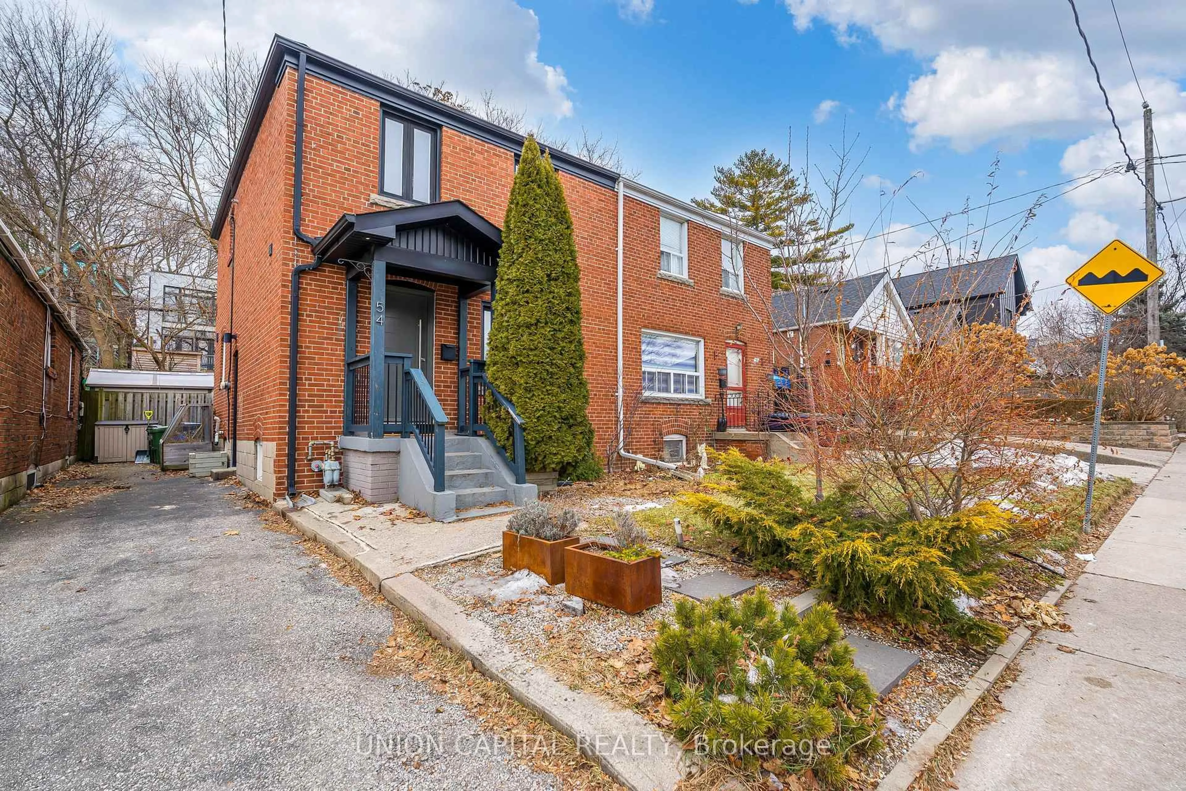 Home with brick exterior material, street for 54 Glenside Ave, Toronto Ontario M4L 2T5