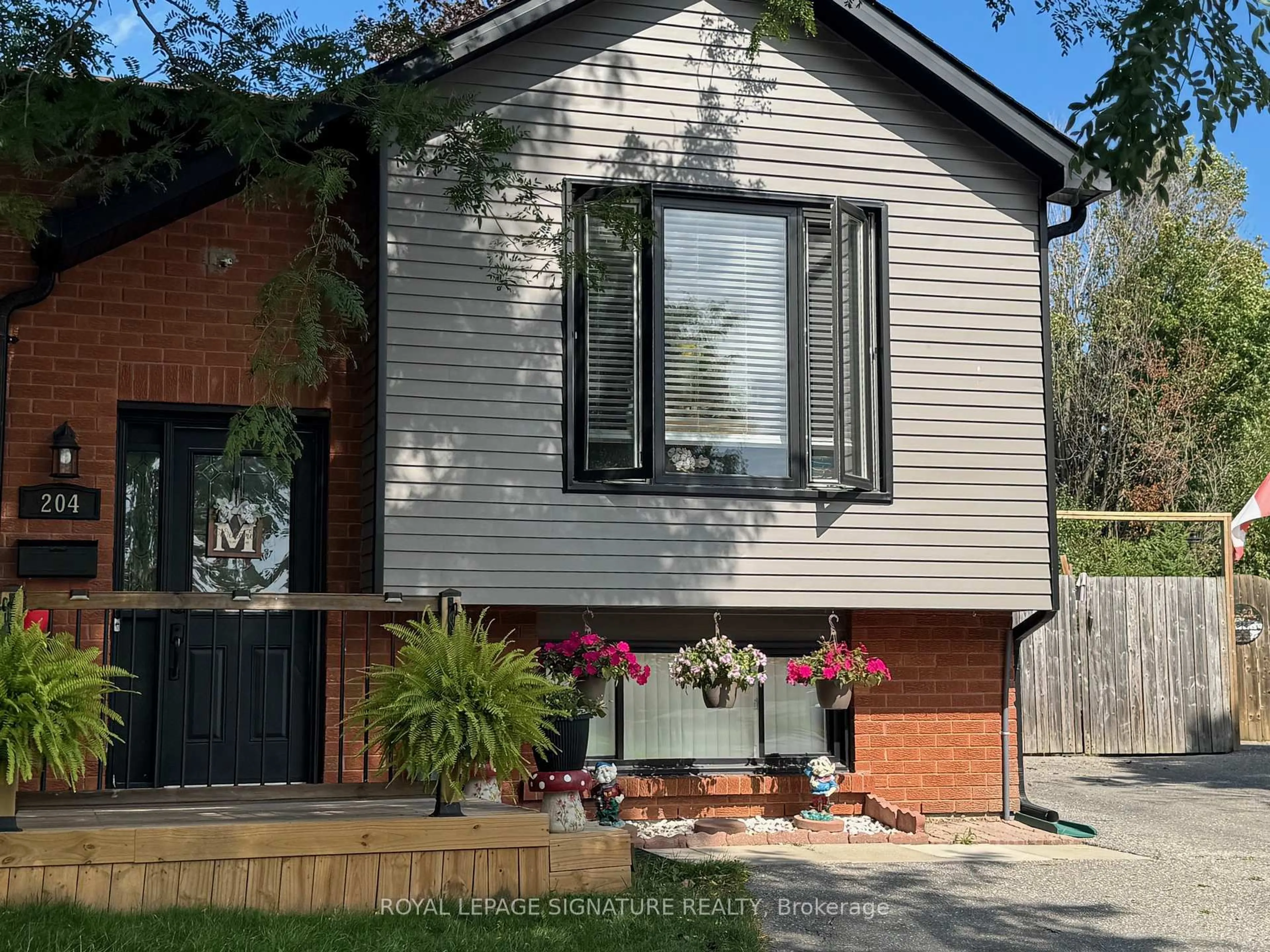 Home with brick exterior material, street for 204 Medina Crt, Oshawa Ontario L1J 7E1