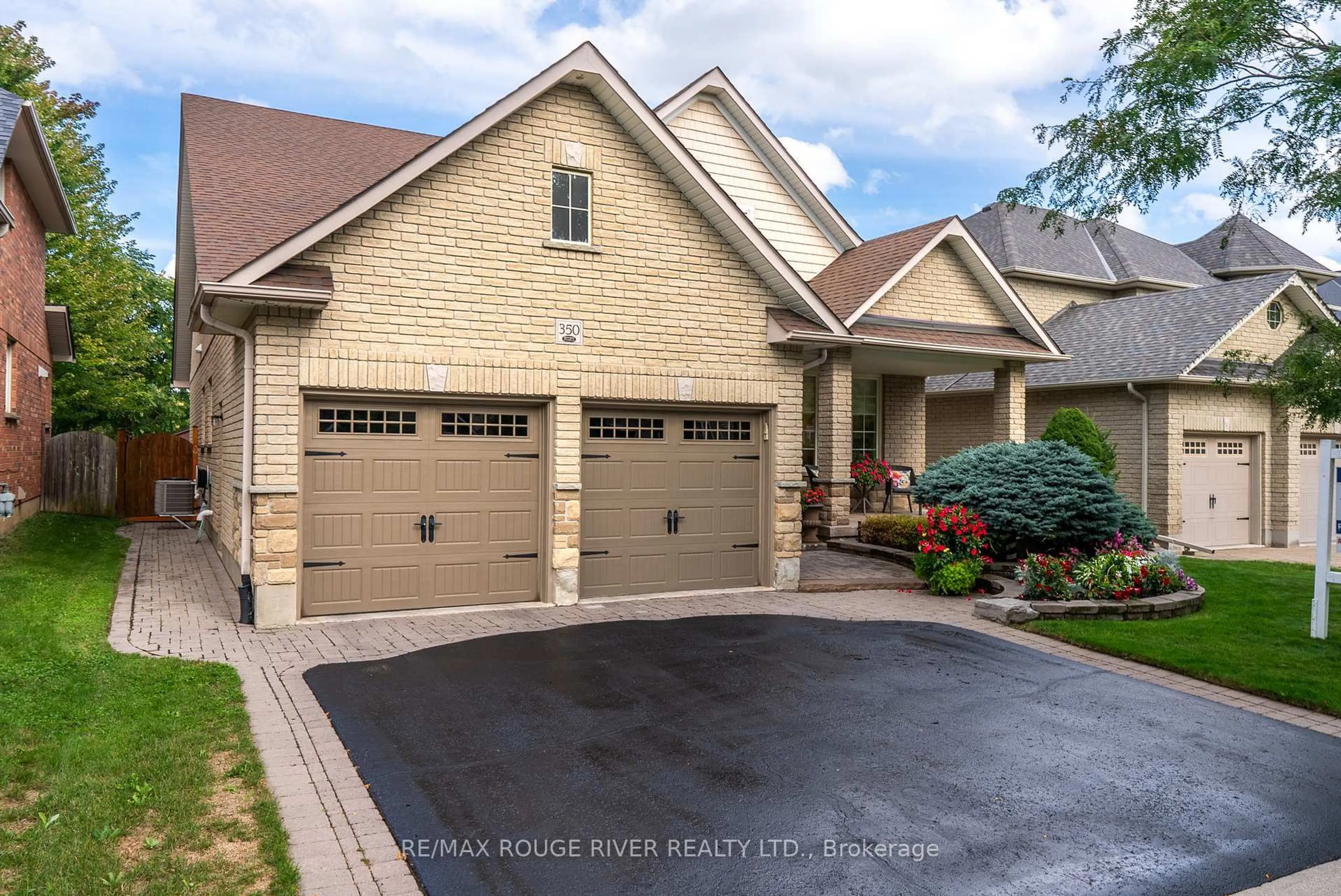 Home with brick exterior material, street for 350 Raike Dr, Oshawa Ontario L1L 0B1
