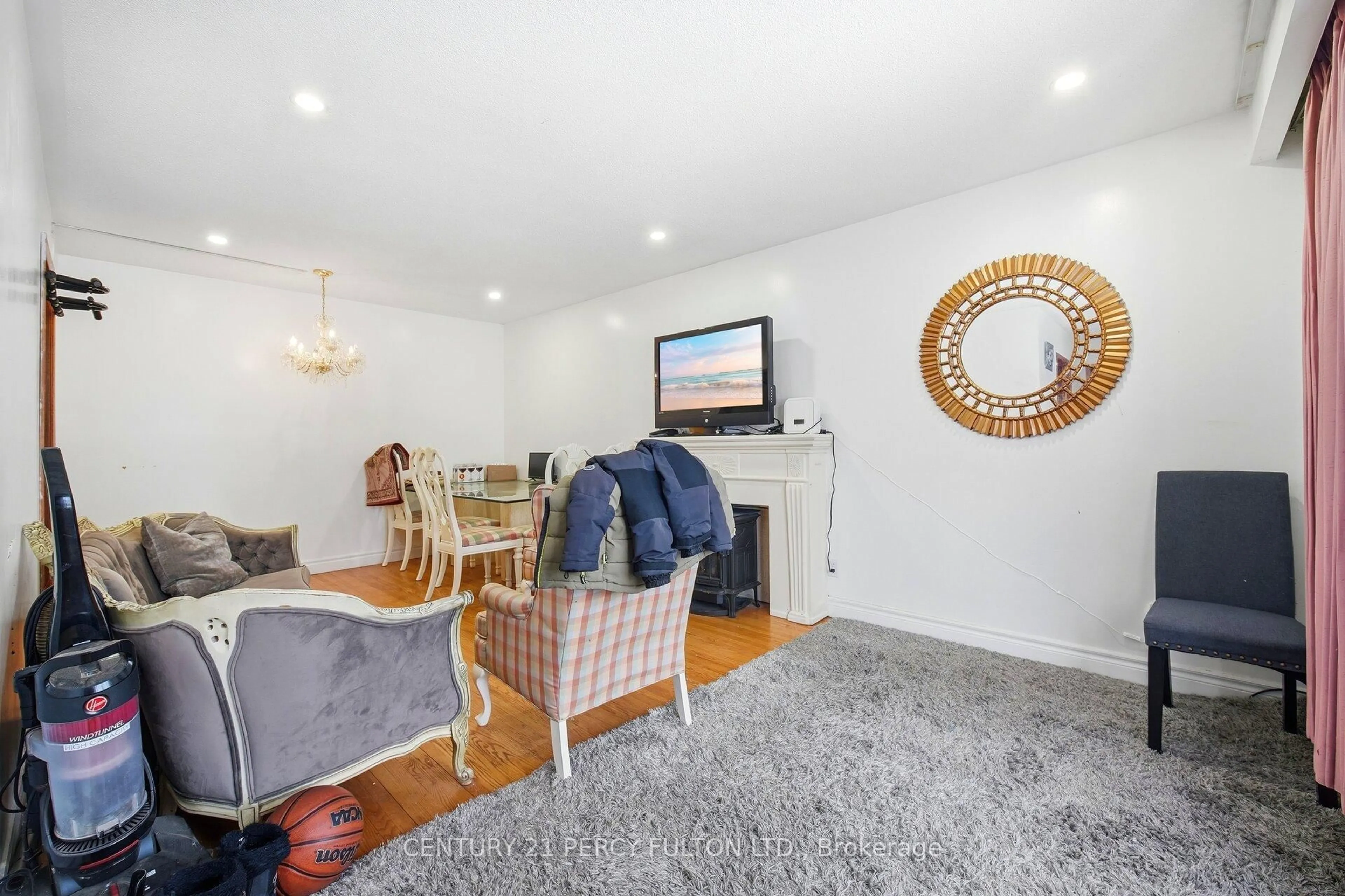 Living room with furniture, wood/laminate floor for 325 Dyson Rd, Pickering Ontario L1W 2N1