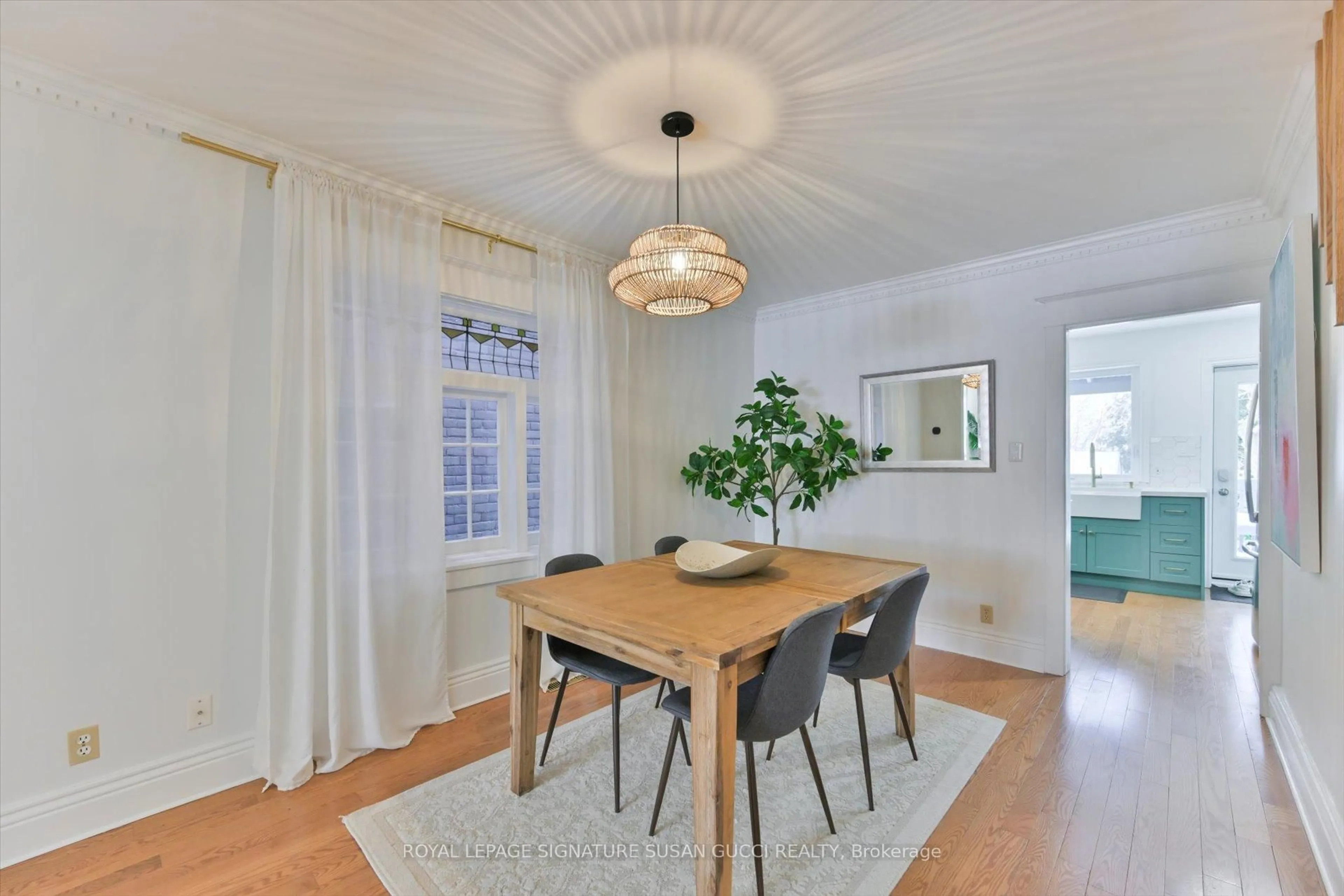 Dining room, wood/laminate floor for 925 Greenwood Ave, Toronto Ontario M4J 4C2