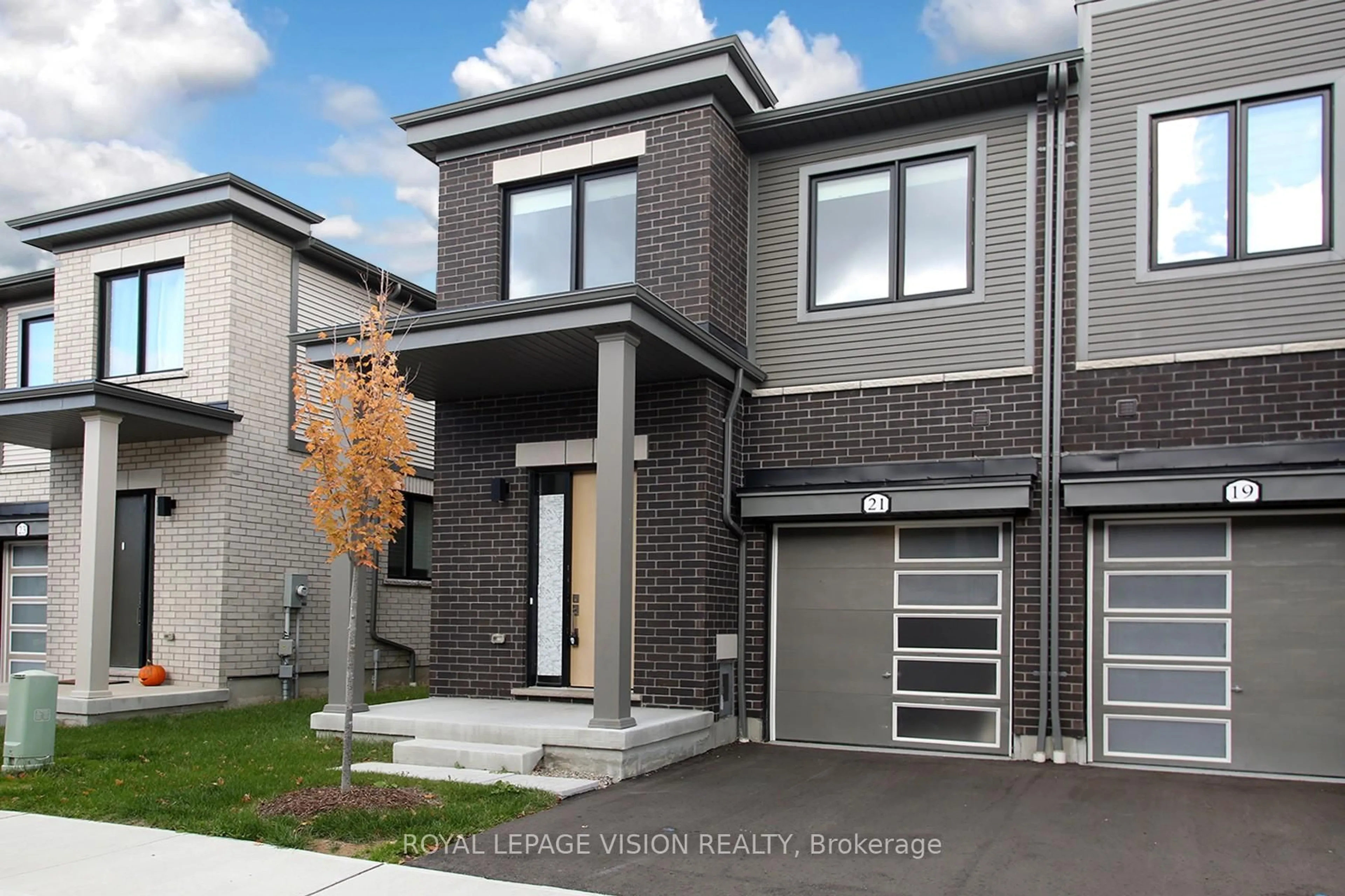 Home with brick exterior material, street for 21 Sorbara Way, Whitby Ontario L1M 0M4