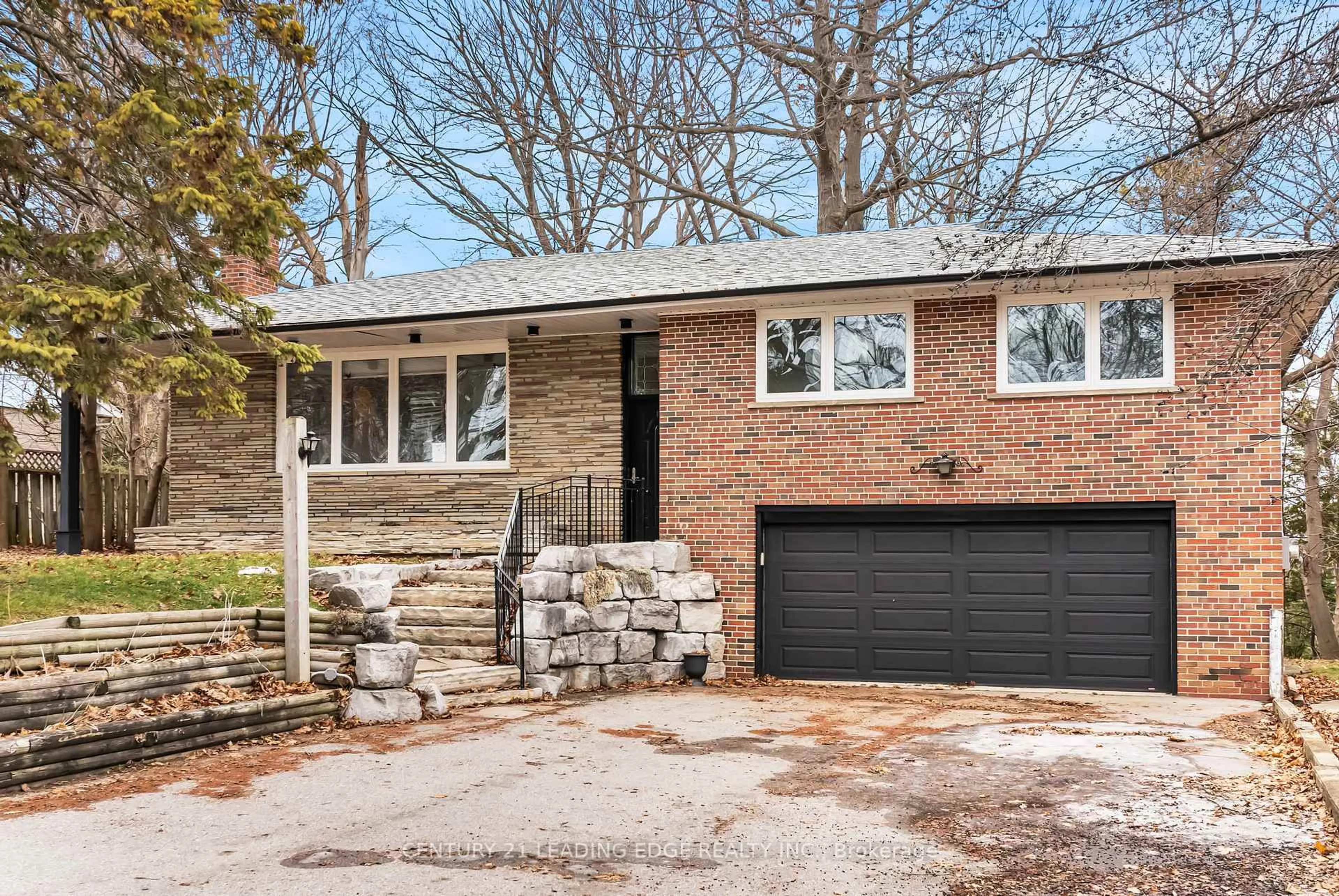 Home with brick exterior material, street for 541 Rouge Hills Dr, Toronto Ontario M1C 2Z9