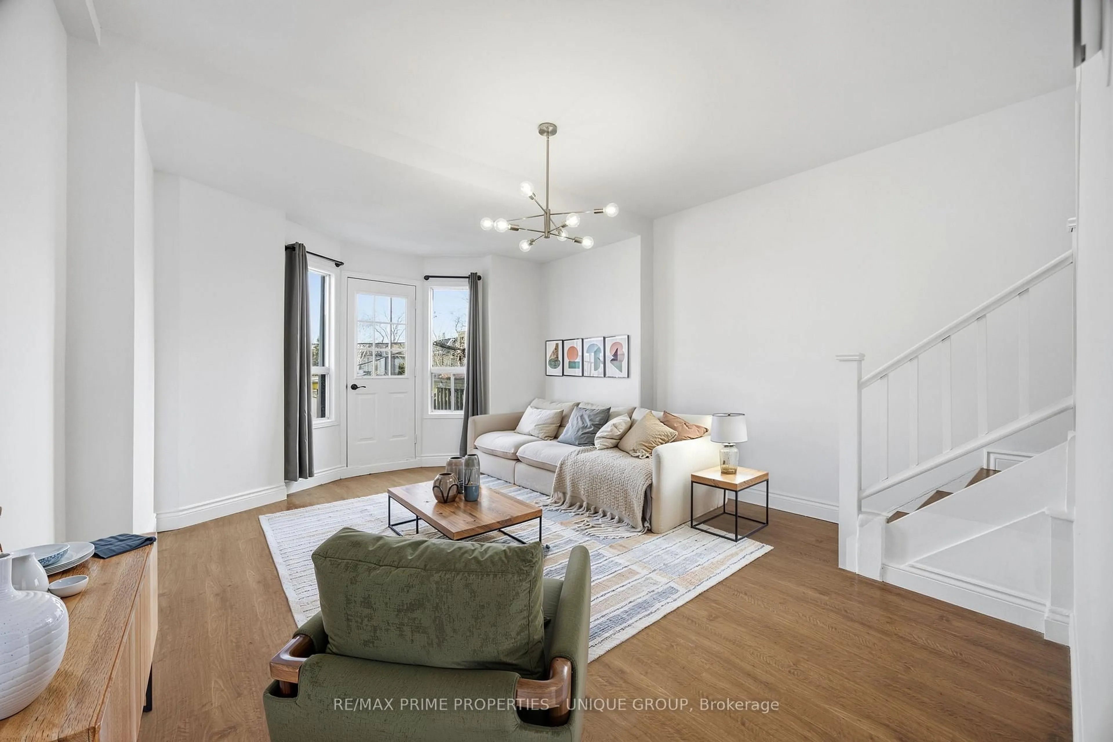 Living room with furniture, unknown for 589 Logan Ave, Toronto Ontario M4K 3B9