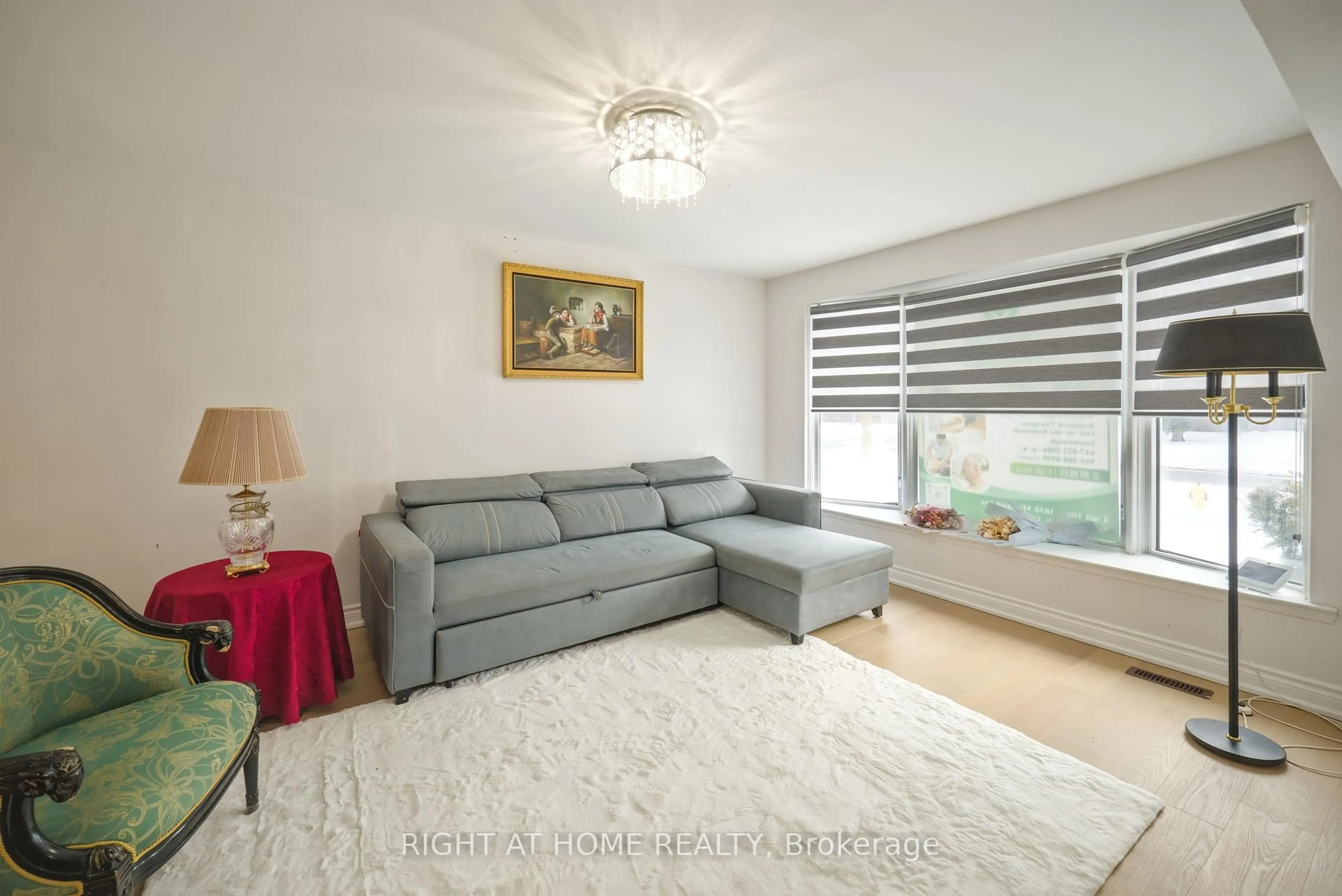 Living room with furniture, unknown for 1230 Huntingwood Dr, Toronto Ontario M1S 1K8