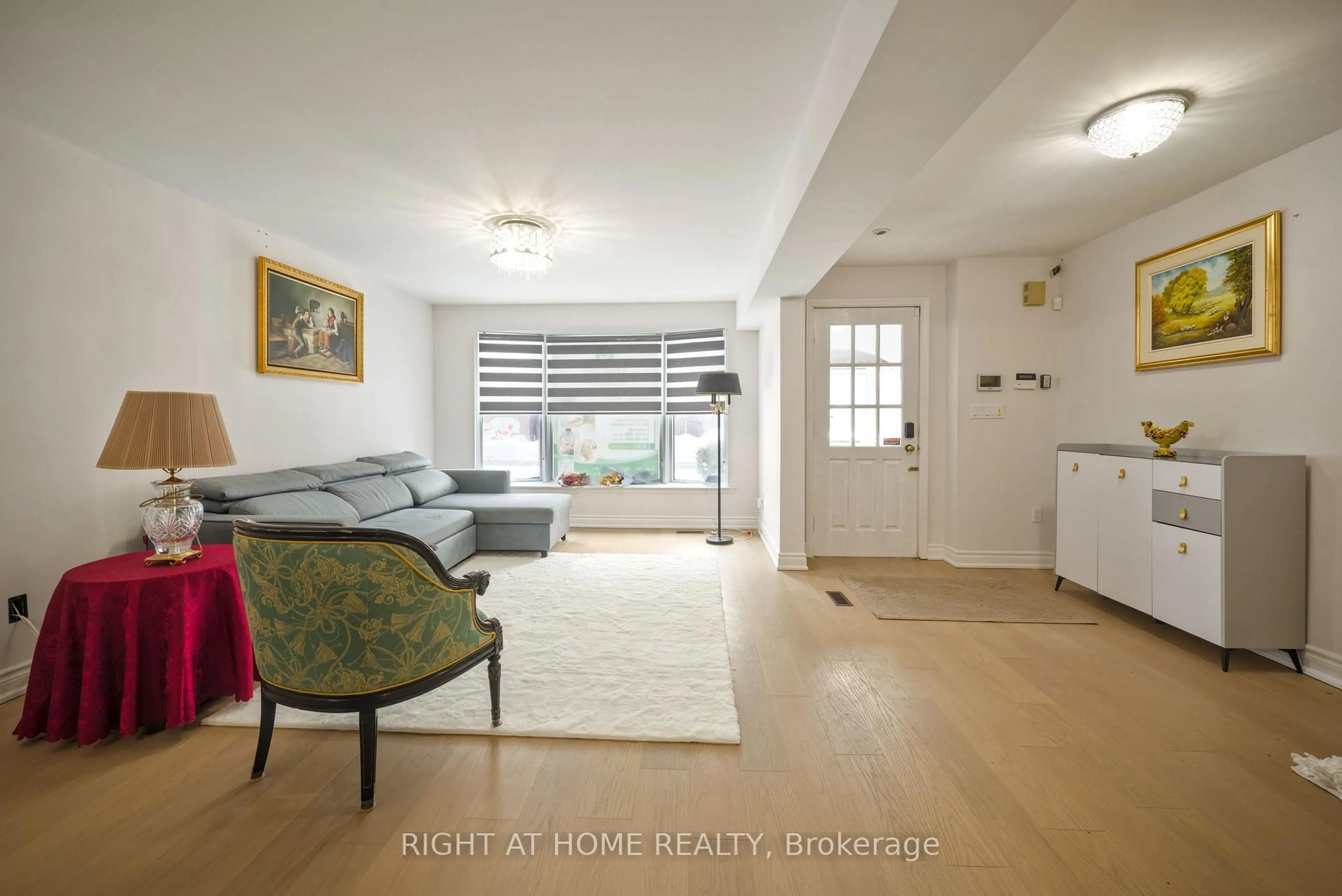 Living room with furniture, unknown for 1230 Huntingwood Dr, Toronto Ontario M1S 1K8