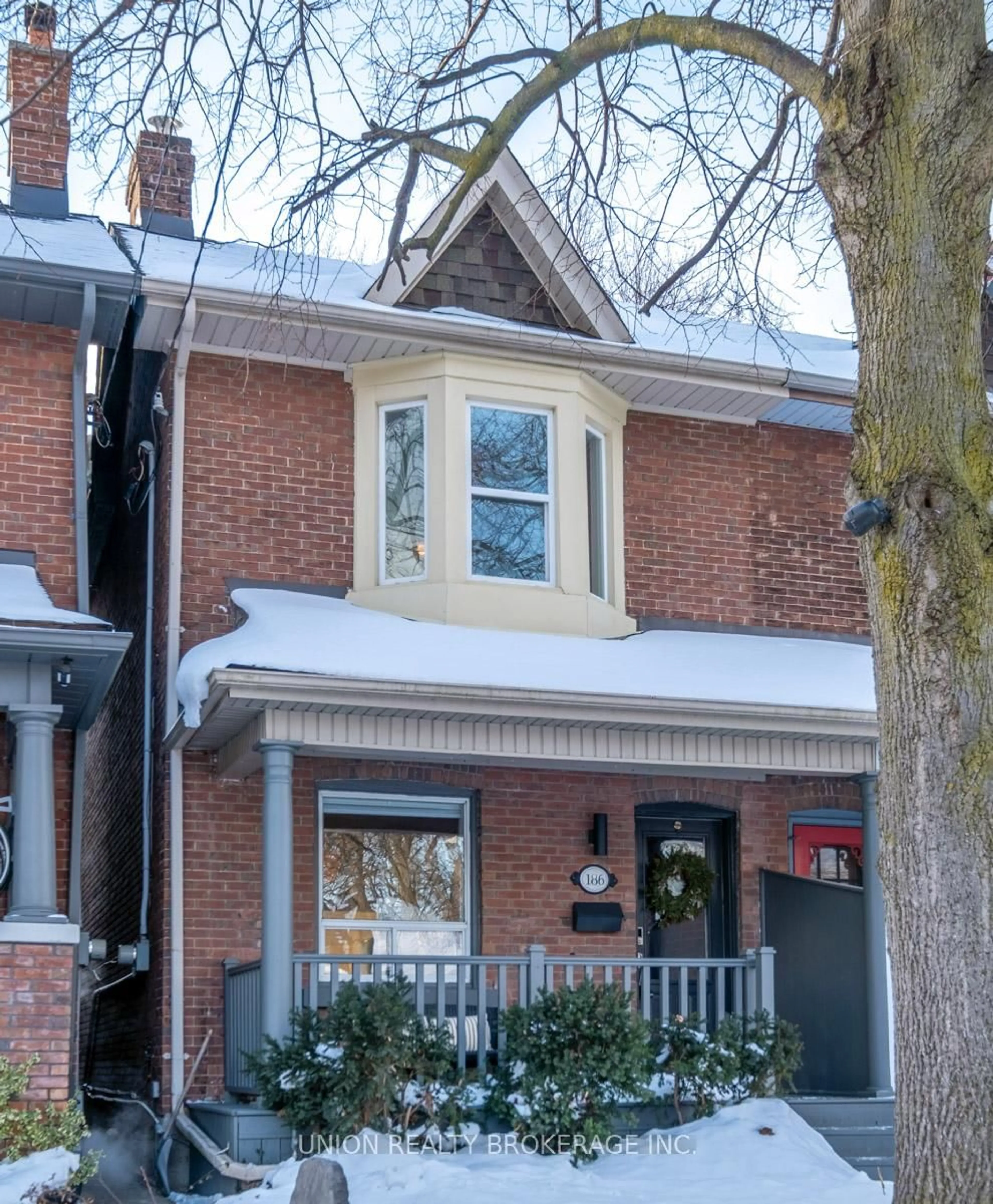 Home with brick exterior material, street for 186 Scarborough Rd, Toronto Ontario M4E 3M6