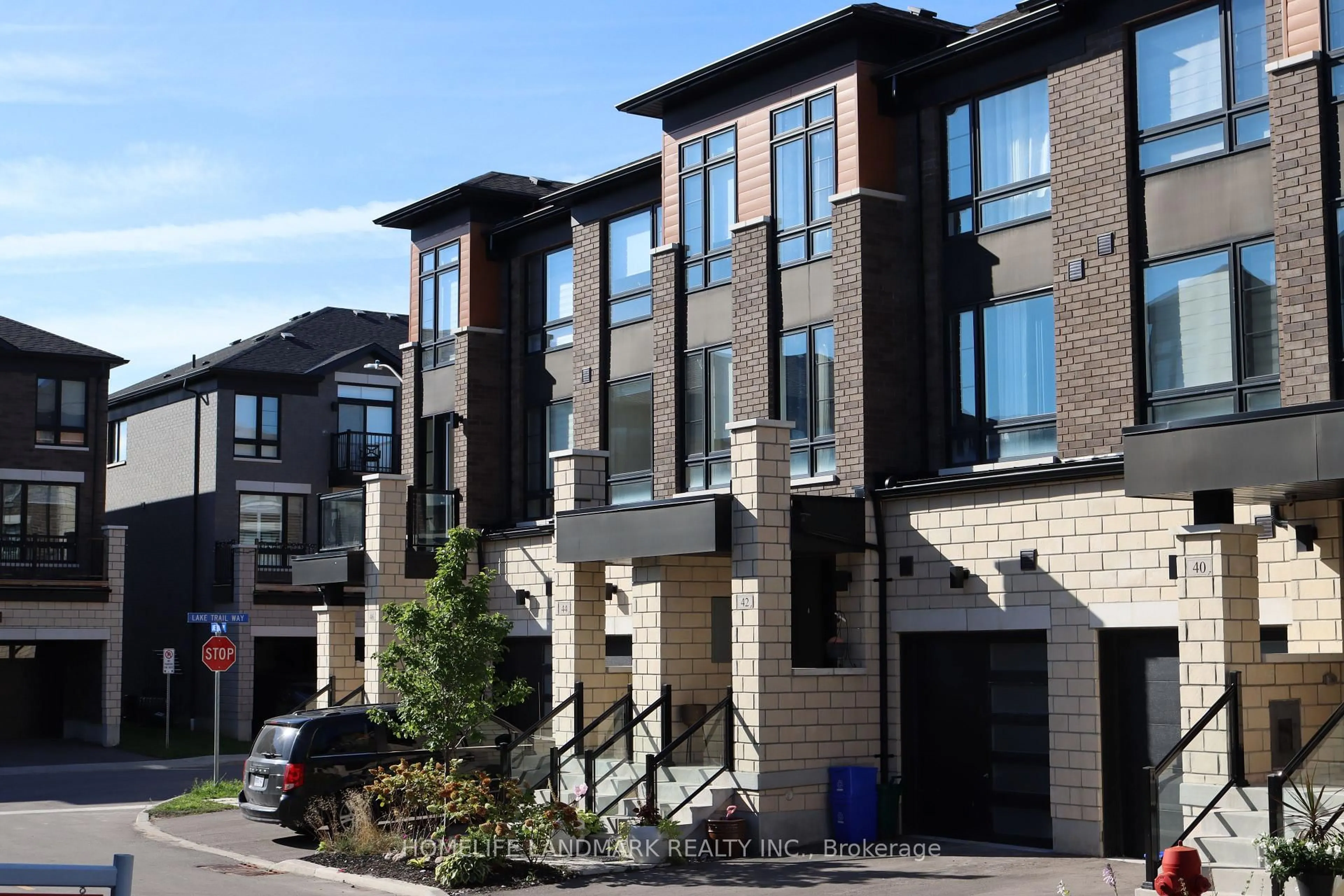 Home with brick exterior material, street for 42 Lake Trail Way, Whitby Ontario L1M 0M3