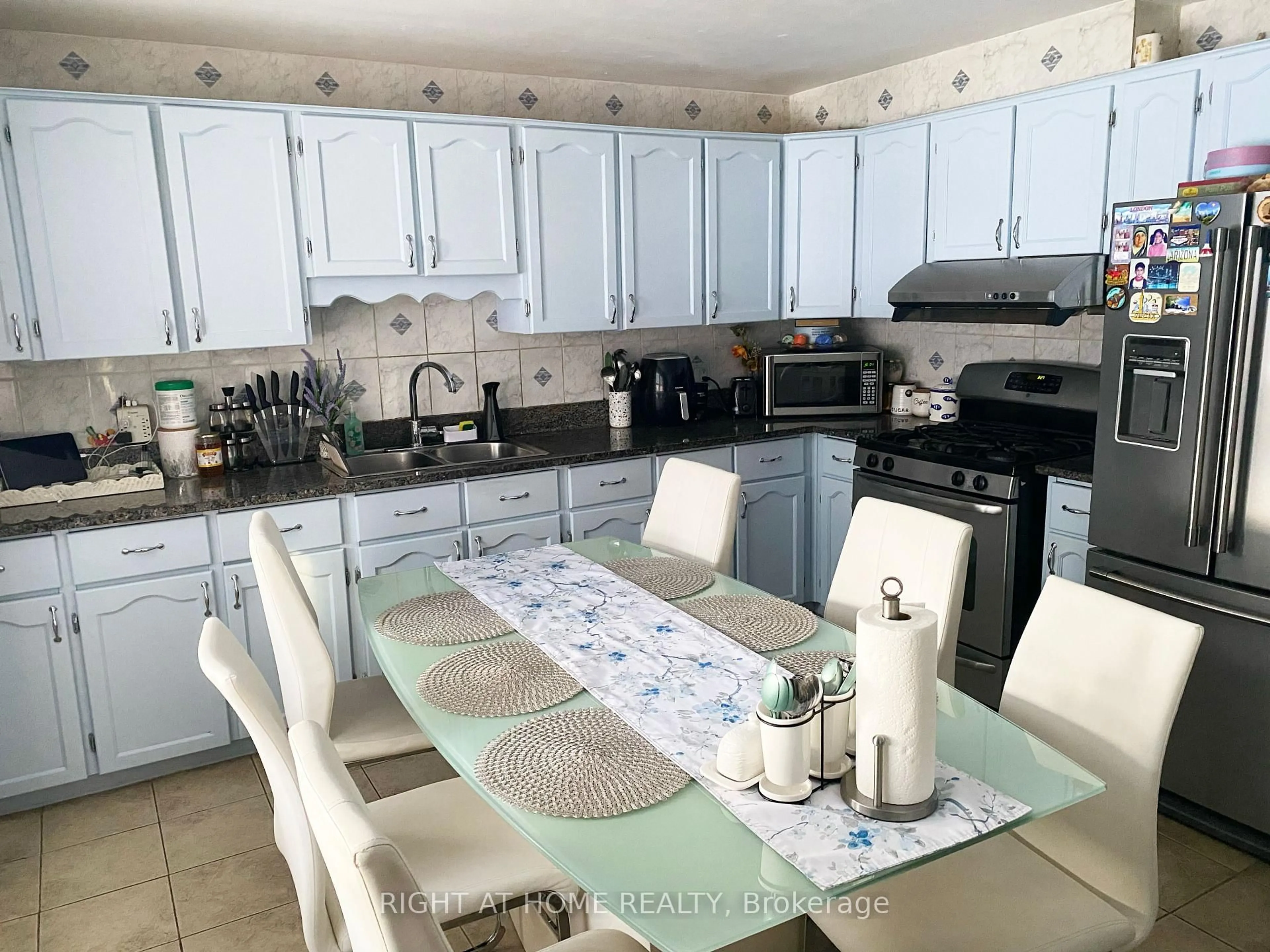 Open concept kitchen, ceramic/tile floor for 42 Yardley Ave, Toronto Ontario M4B 2A8