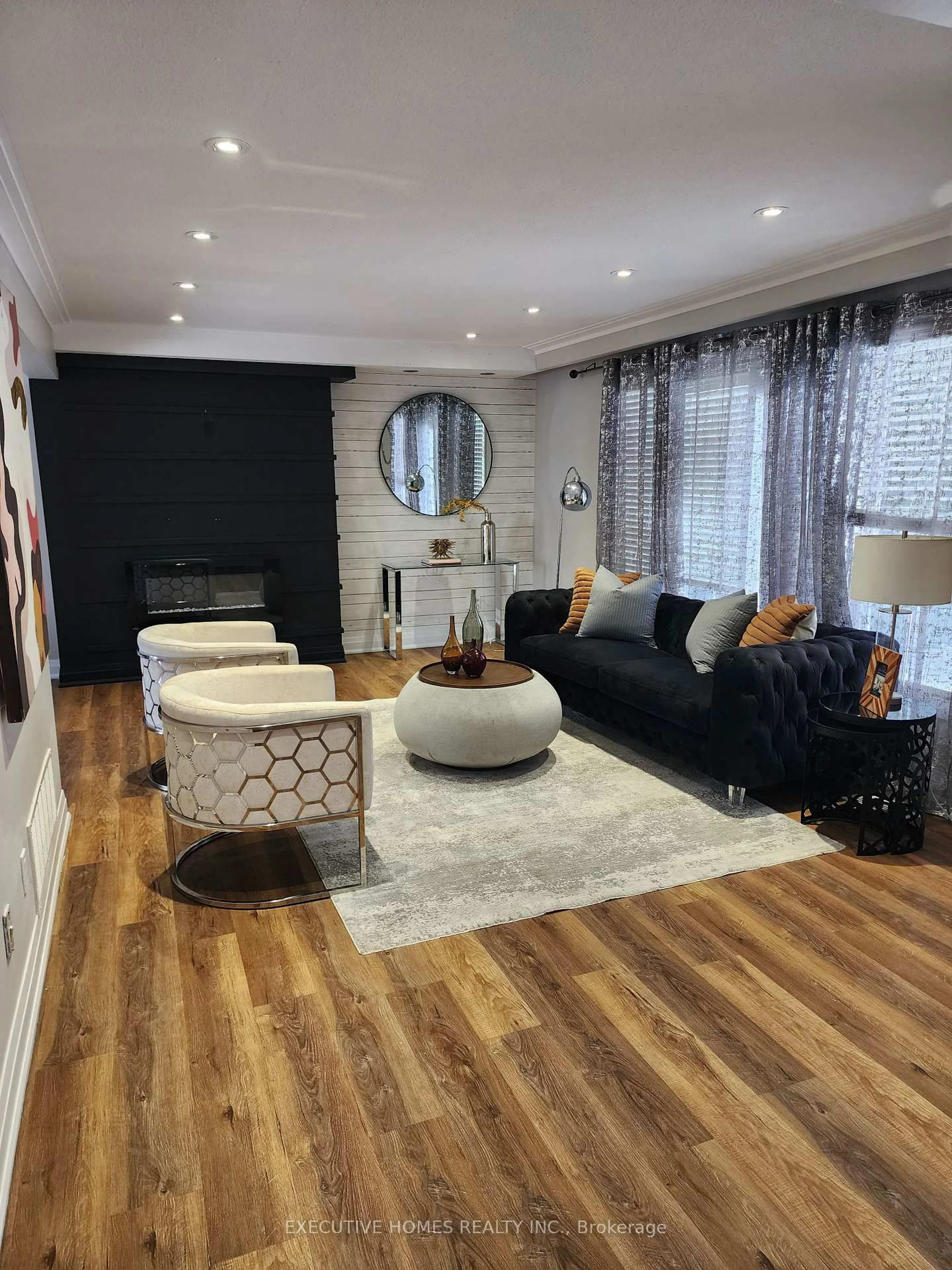 Living room with furniture, wood/laminate floor for 37 Marcella St, Toronto Ontario M1G 1K9