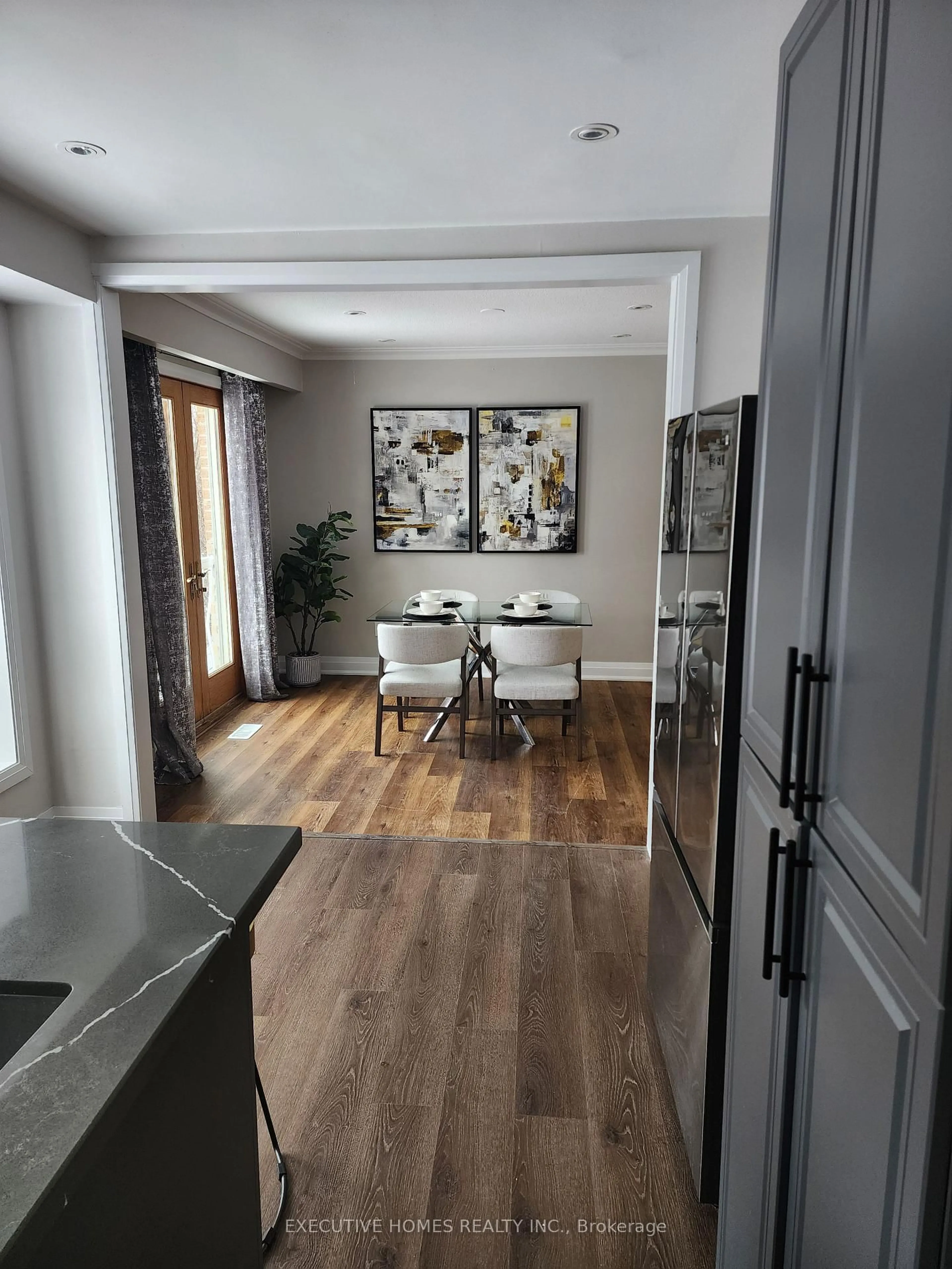 Dining room, wood/laminate floor for 37 Marcella St, Toronto Ontario M1G 1K9