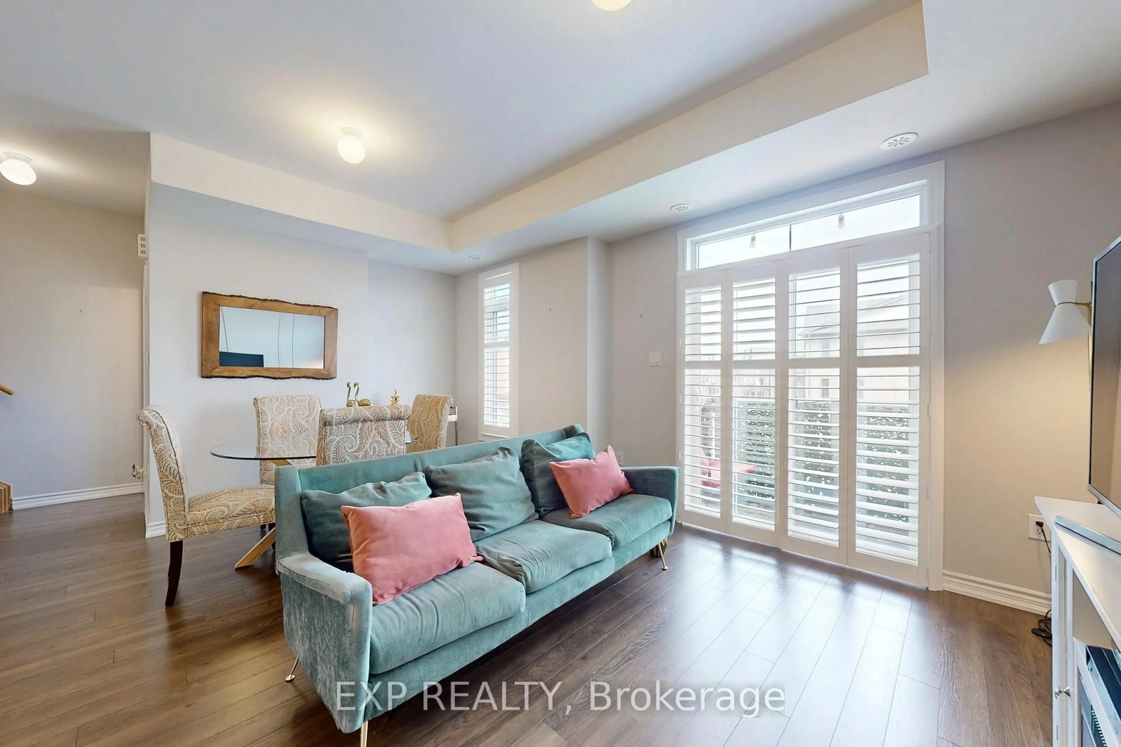 Living room with furniture, wood/laminate floor for 2584 William Jackson Dr #94, Pickering Ontario L1X 0E5