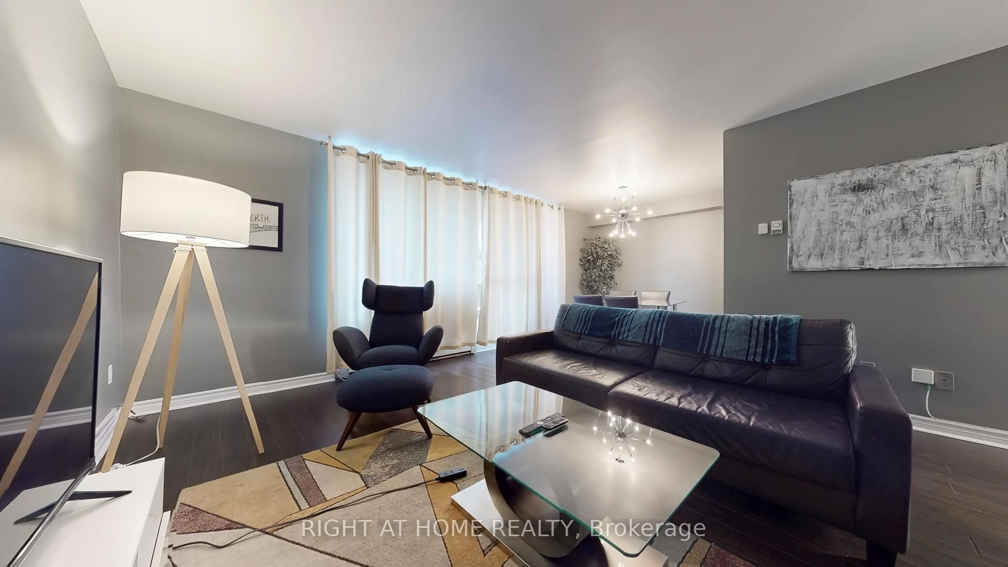 Living room with furniture, unknown for 5 Massey Sq #219, Toronto Ontario M4C 5L4