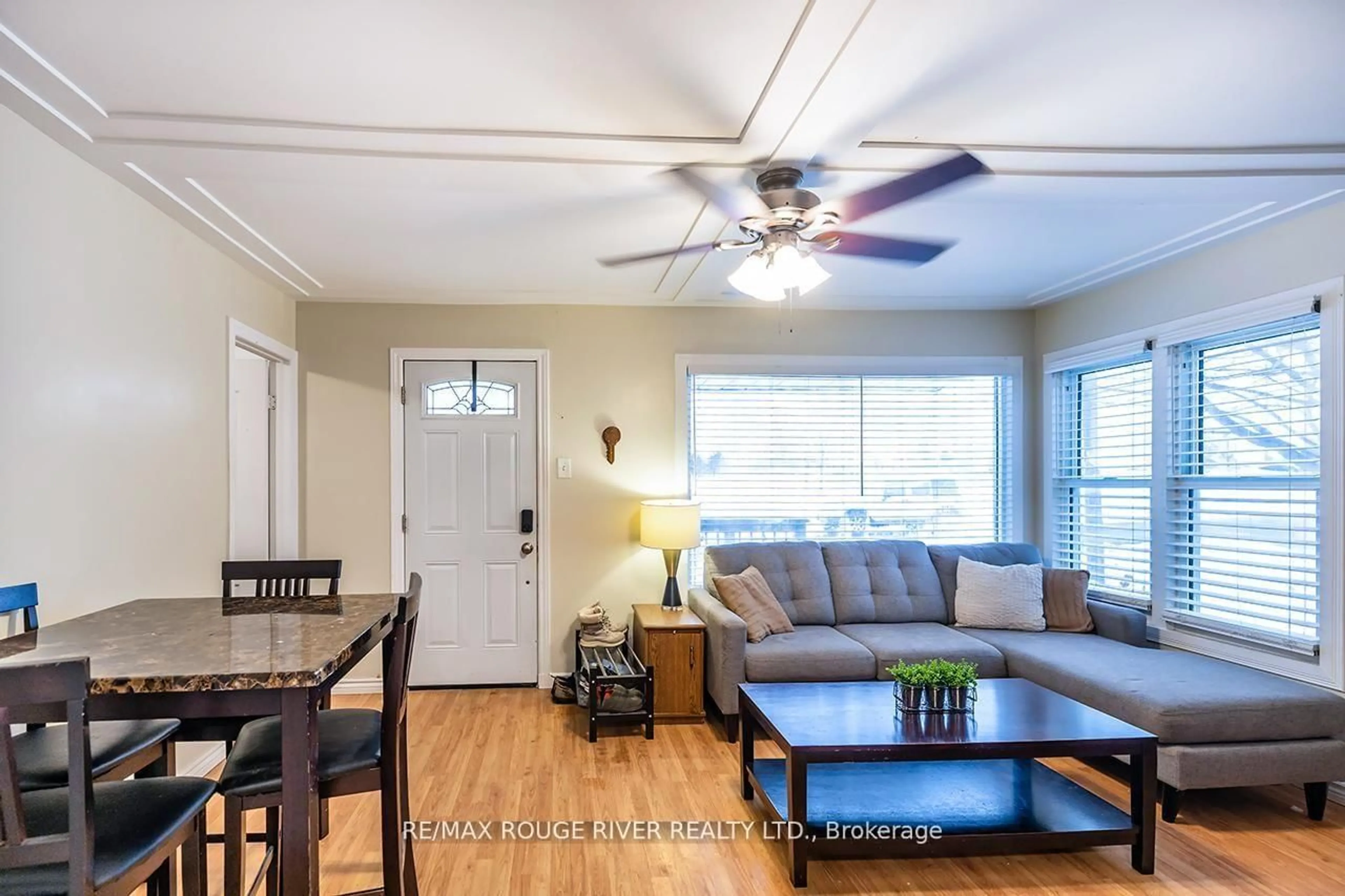 Living room with furniture, wood/laminate floor for 8 Birch Cres, Ajax Ontario L1S 1X4